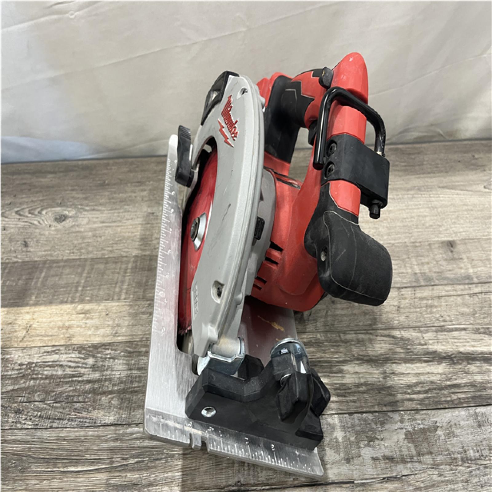 AS-IS Milwaukee 18V Lithium-Ion Brushless Cordless 7-1/4 in. Circular Saw (Tool-Only)