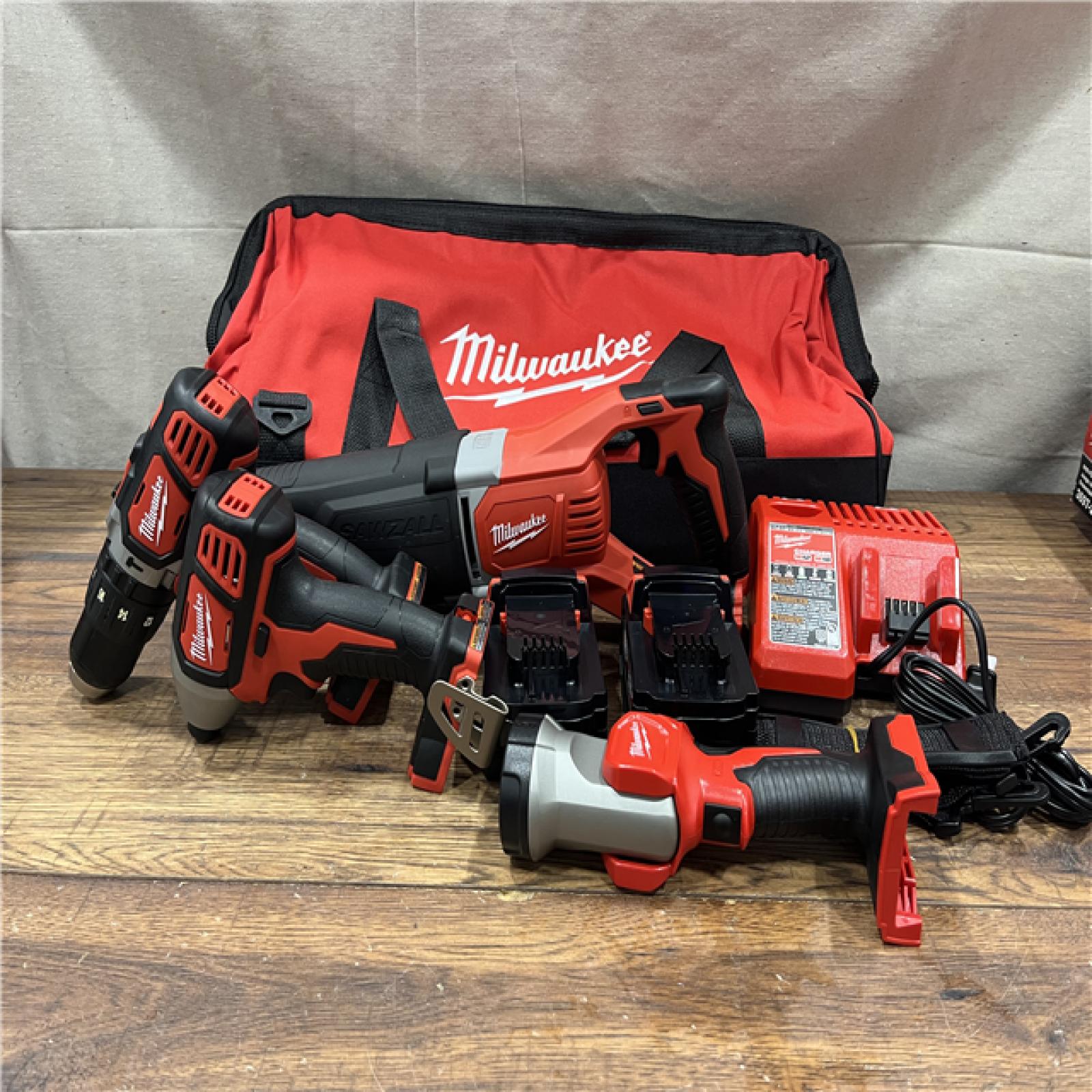 AS-IS  M18 18V Lithium-Ion Cordless Combo Tool Kit with Two 3.0Ah Batteries, 1-Charger, 1-Tool Bag (4-Tool)