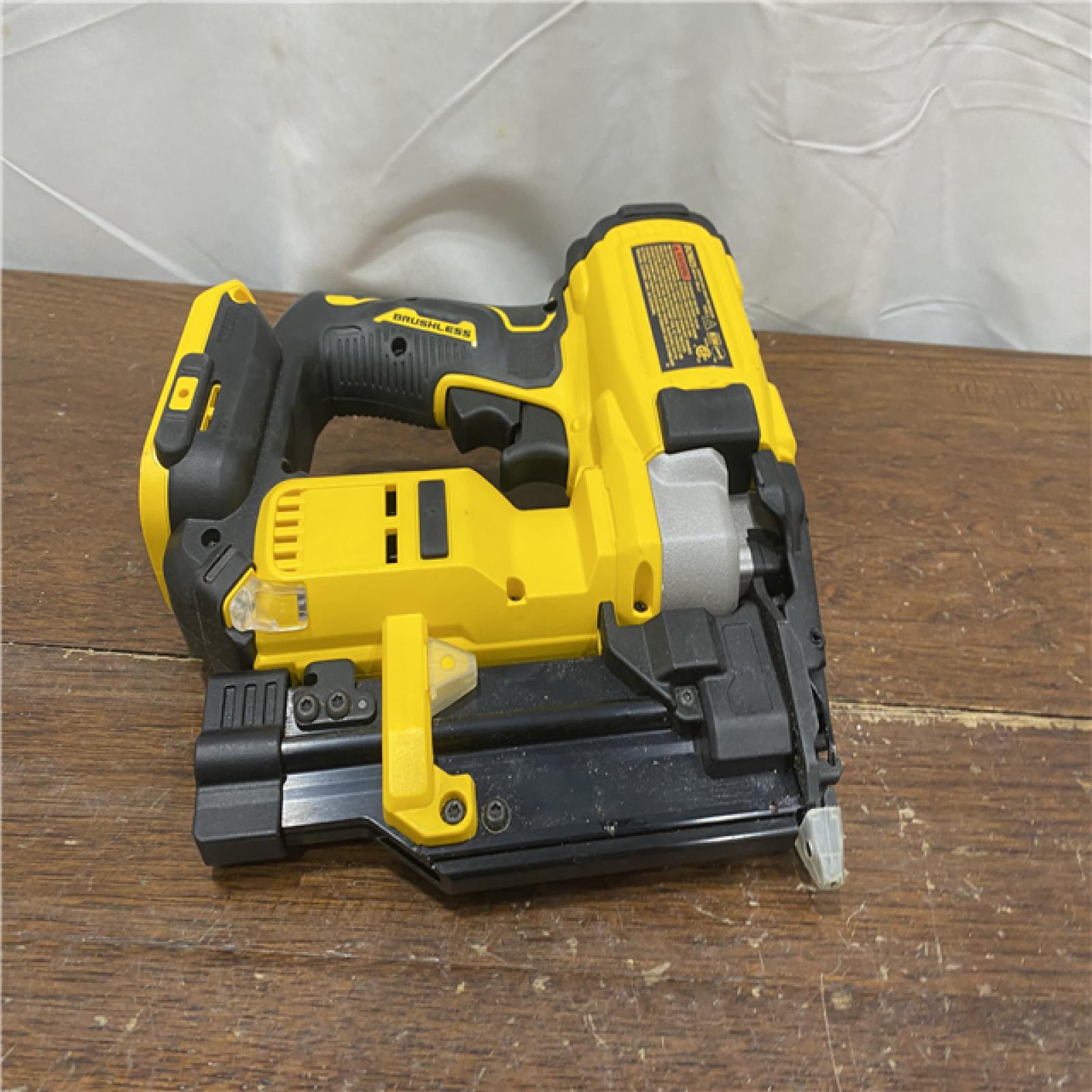 AS-IS DEWALT ATOMIC 20V MAX Lithium Ion Cordless 23 Gauge Pin Nailer Kit with 3.0Ah Battery and Charger