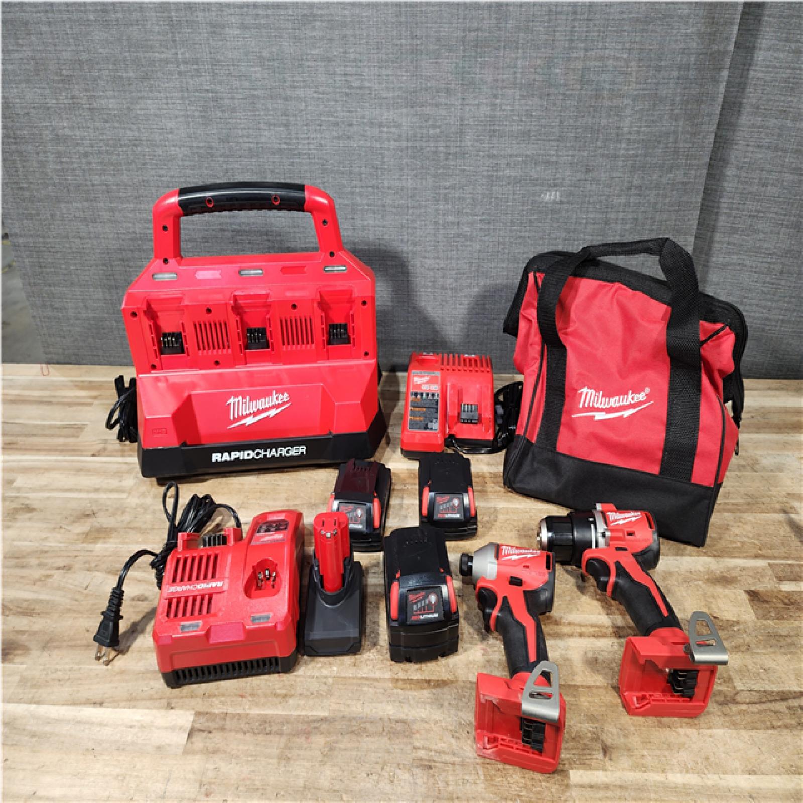 Houston Location Milwaukee Drills QTY/2 and Rapid Charger and Batteries QTY/4 with Charger