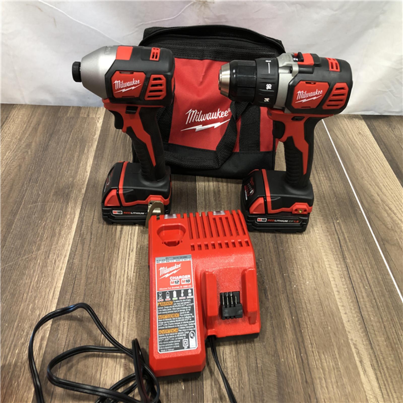 AS-IS Milwaukee M18 18V Lithium-Ion Cordless Drill Driver/Impact Driver Combo Kit