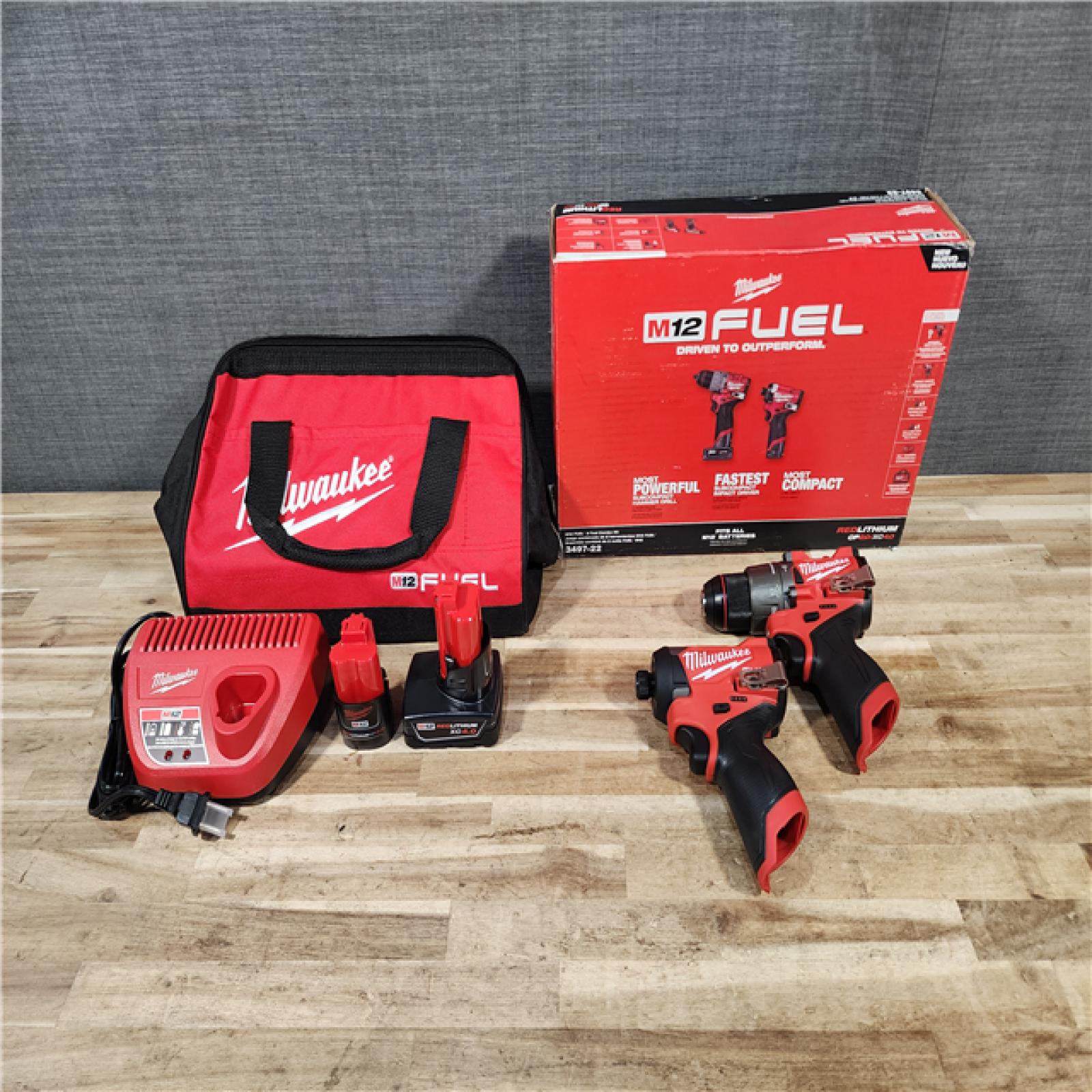 HOUSTON LOCATION - AS-IS (APPEARS LIKE NEW) Milwaukee  FUEL 12-Volt Lithium-Ion Brushless Cordless Hammer Drill and Impact Driver Combo Kit