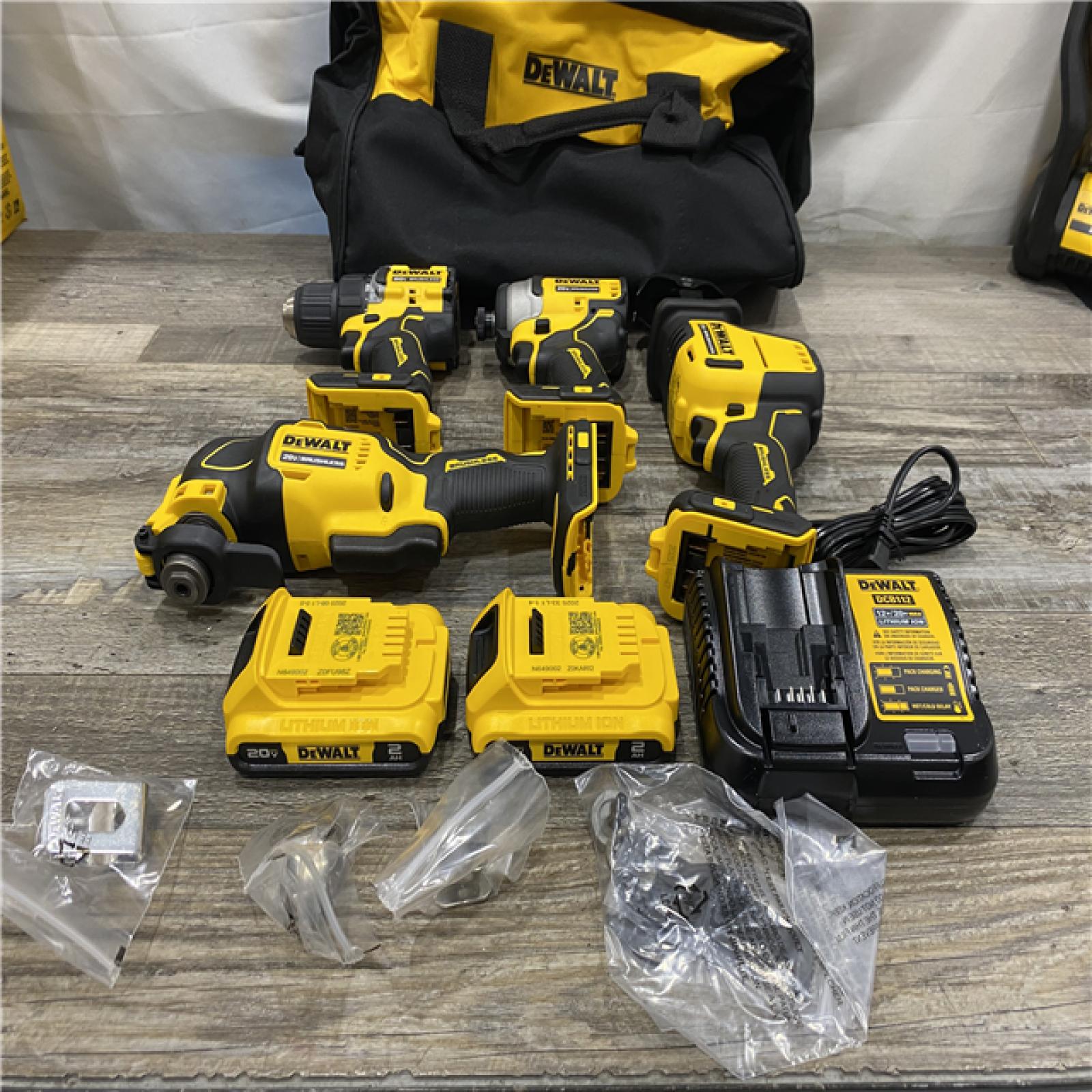 AS-IS DEWALT ATOMIC 20-Volt Lithium-Ion Cordless Brushless (4-Tool) Combo Kit