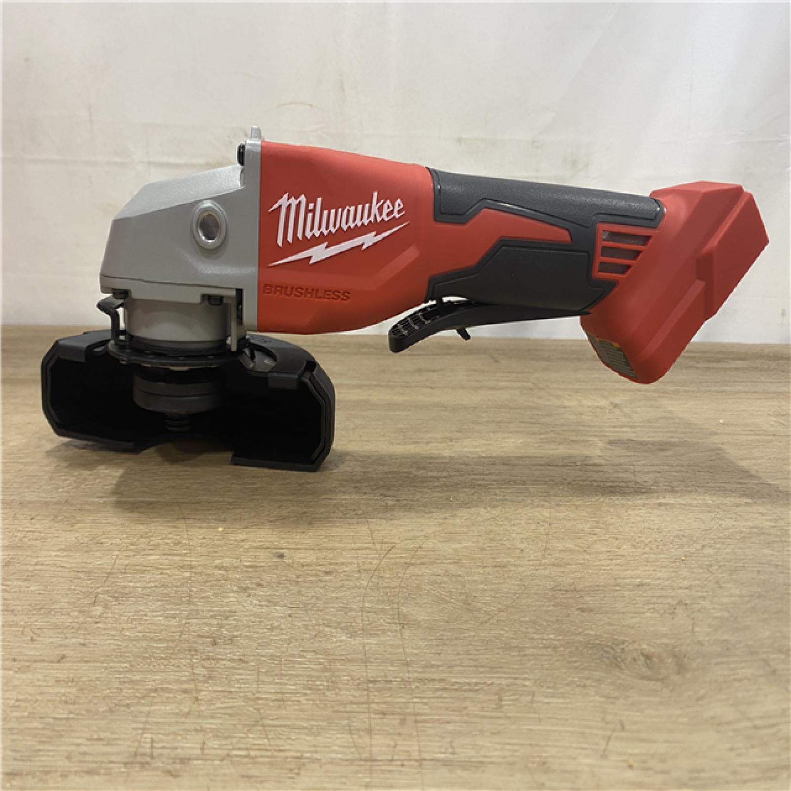AS-IS Milwaukee 18V Lithium-Ion Brushless Cordless 4-1/2 in./5 in. Grinder w/Paddle Switch (Tool-Only)