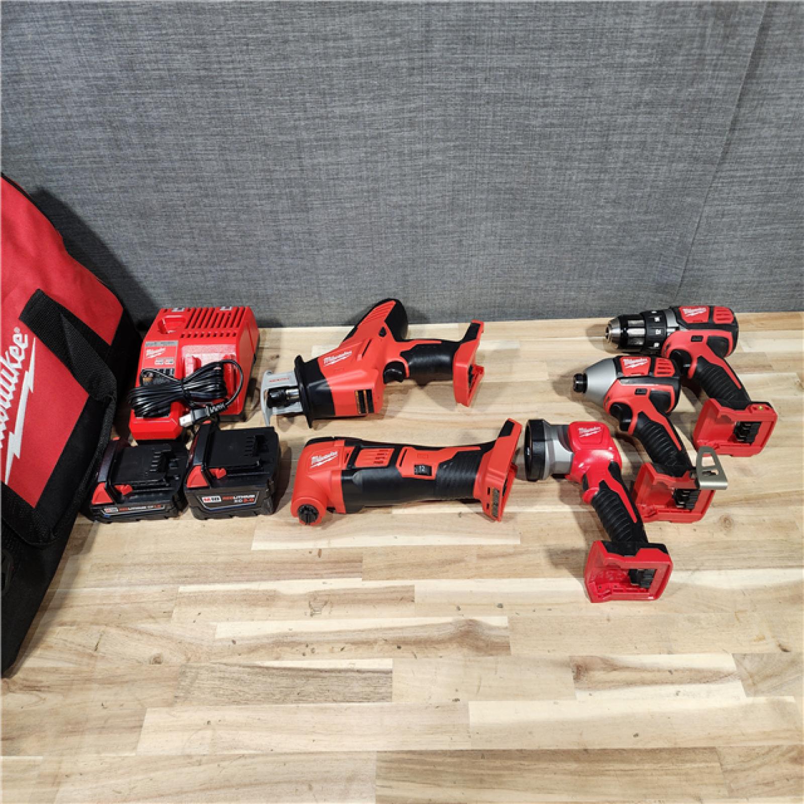 HOUSTON LOCATION - AS-IS MILWAUKEE 5 TOOL COMBO KIT W/ (2) BATTERY & CHARGER