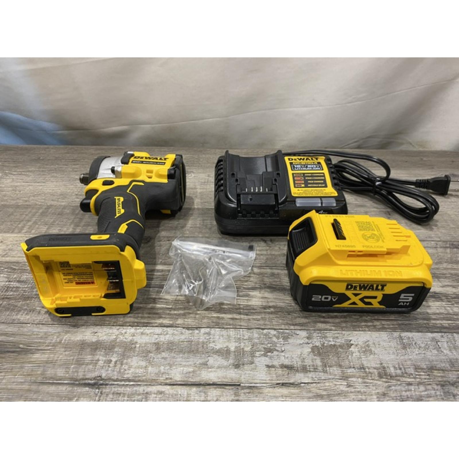 AS-IS DEWALT ATOMIC 20V MAX Lithium-Ion Brushless Cordless 1/2 in. Variable Speed Impact Wrench Kit
