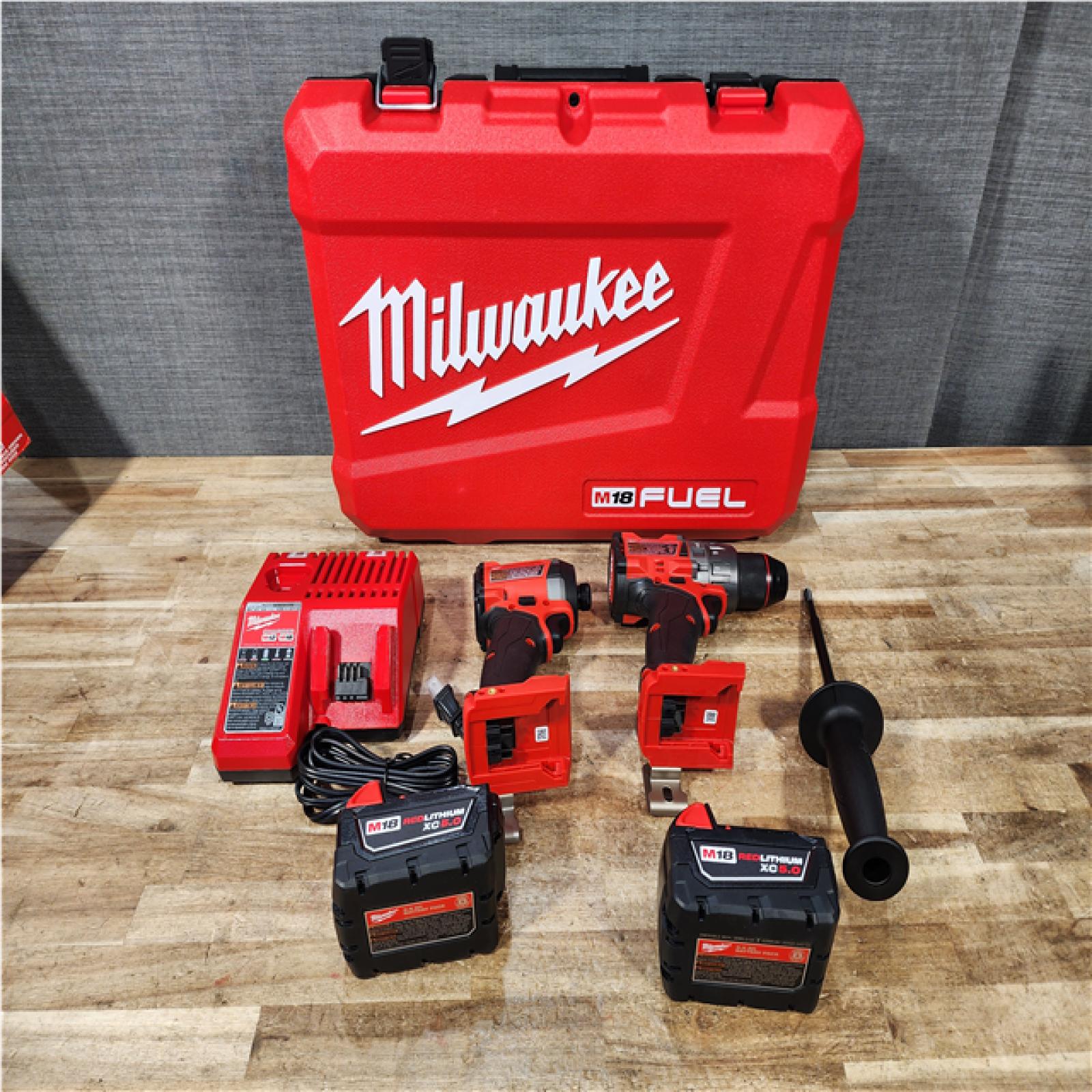 Houston Location AS-IS Milwaukee FUEL 18V Lithium-Ion Brushless Cordless Hammer Drill and Impact Driver Combo Kit