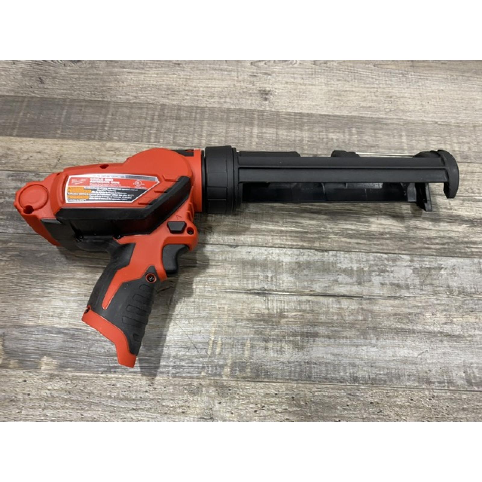 AS-IS Milwaukee 12V Lithium-Ion Cordless 10 oz. Adhesive and Caulk Gun (Tool-Only)