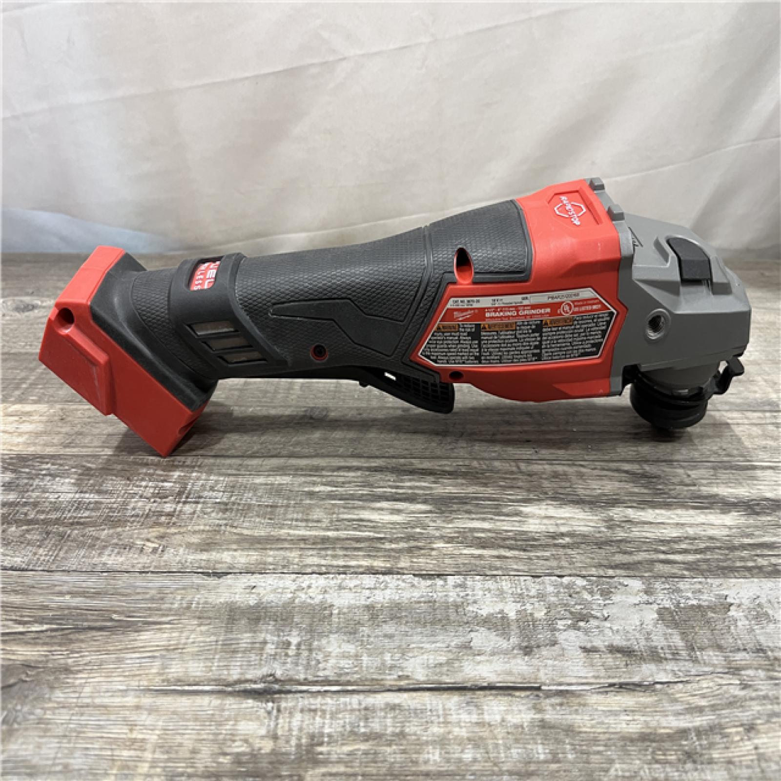 AS-IS Milwaukee FUEL 18-Volt Lithium-Ion Brushless Cordless 4-1/2 in./6 in. Braking Grinder with Paddle Switch (Tool-Only)