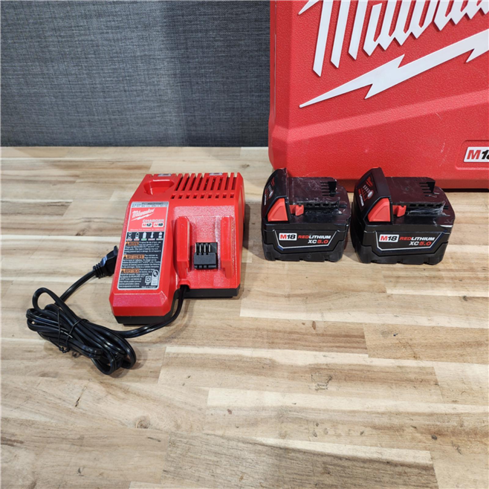 HOUSTON LOCATION - AS-IS Milwaukee  FUEL 18V Lithium-Ion Brushless Cordless Hammer Drill and Impact Driver Combo Kit