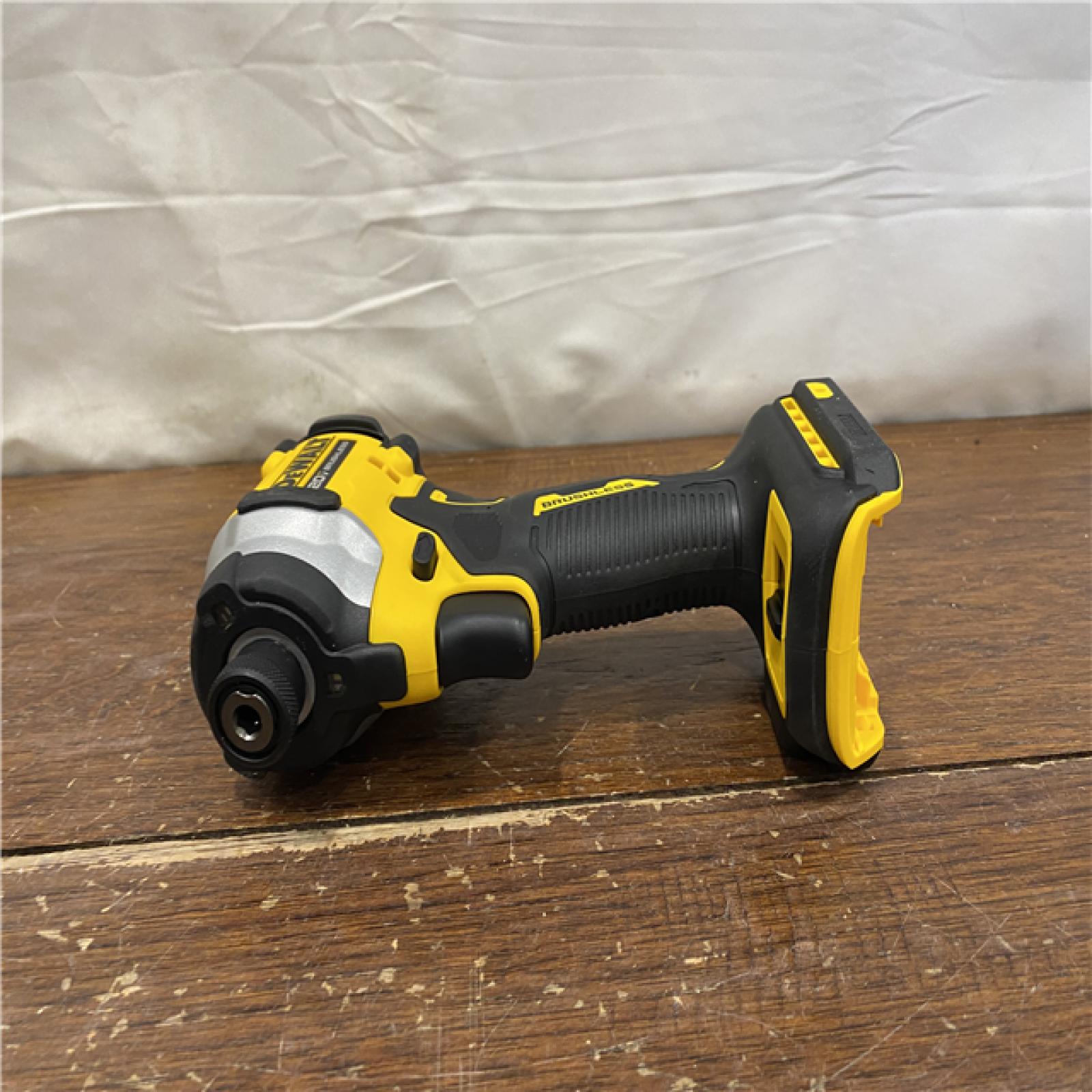 AS-IS DEWALT ATOMIC 20V MAX Lithium-Ion Cordless 1/4 in. Brushless Impact Driver Kit, 5 Ah Battery, Charger, and Bag