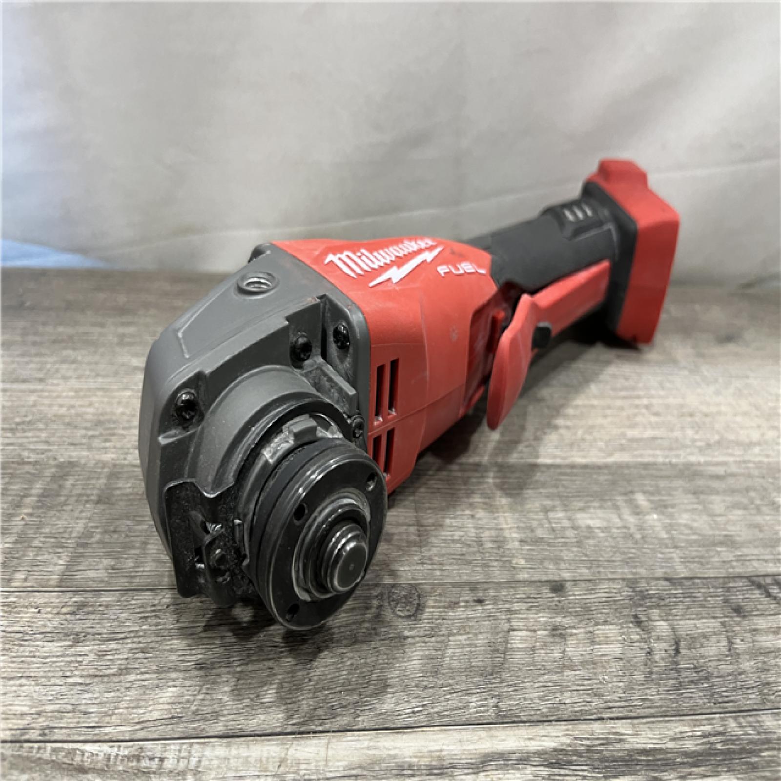 AS-IS Milwaukee FUEL 18V Lithium-Ion Brushless Cordless 4-1/2 in./5 in. Grinder with Variable Speed & Paddle Switch (Tool-Only)