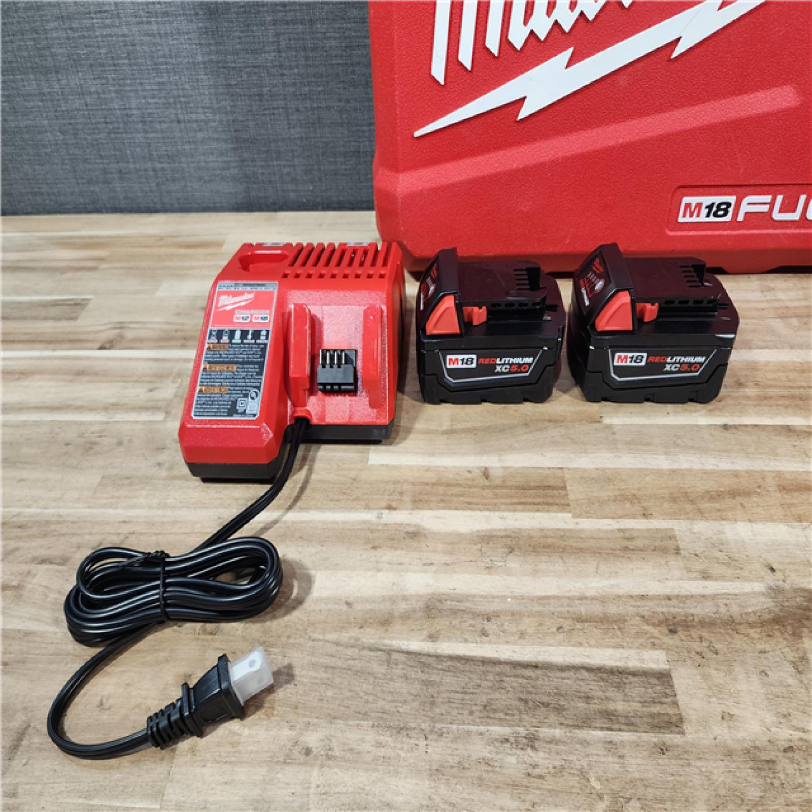 HOUSTON LOCATION - AS-IS Milwaukee  FUEL 18V Lithium-Ion Brushless Cordless Hammer Drill and Impact Driver Combo Kit
