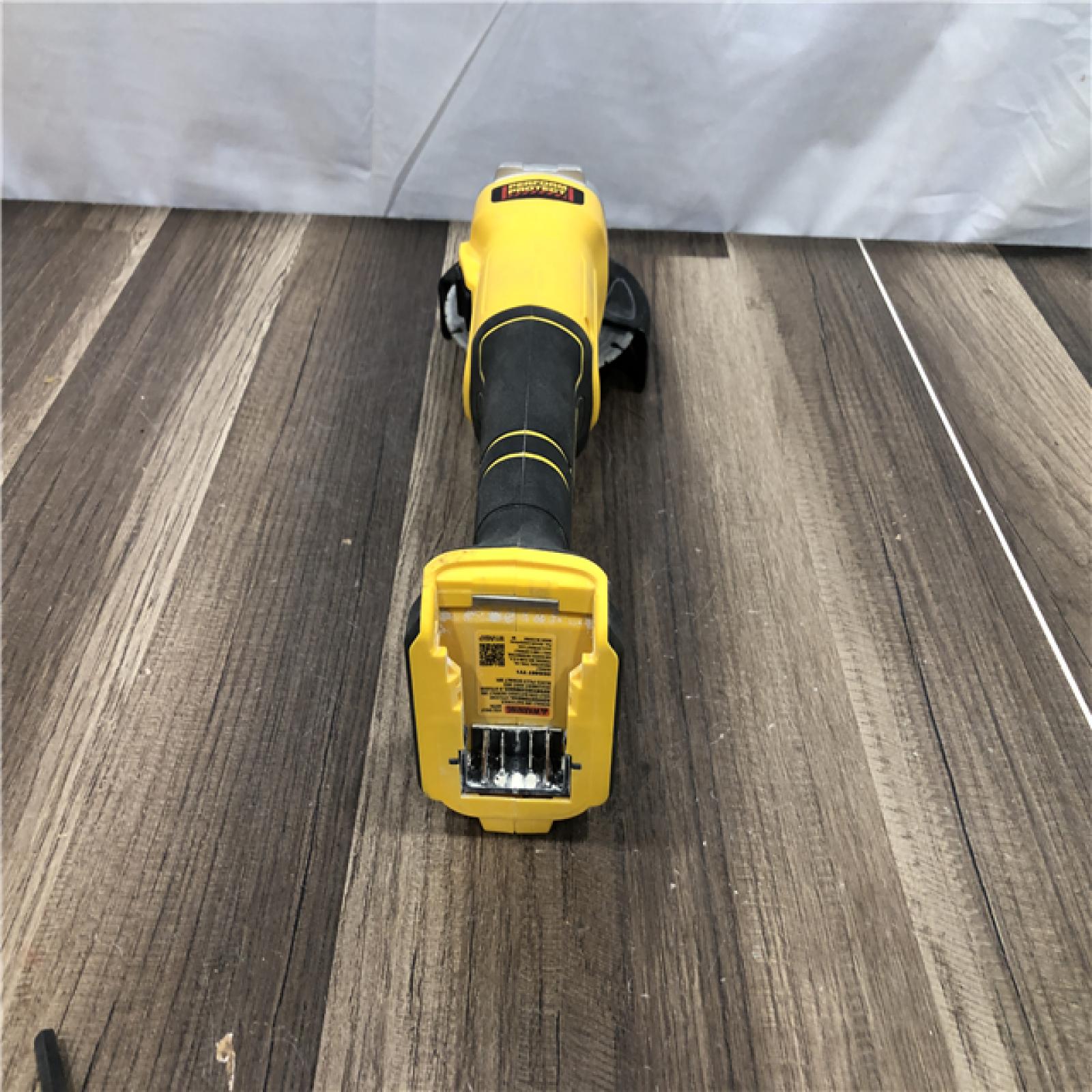 AS-IS DEWALT 20-Volt MAX Cordless Brushless 4-1/2 in. Angle Grinder with Slide Switch (Tool Only)