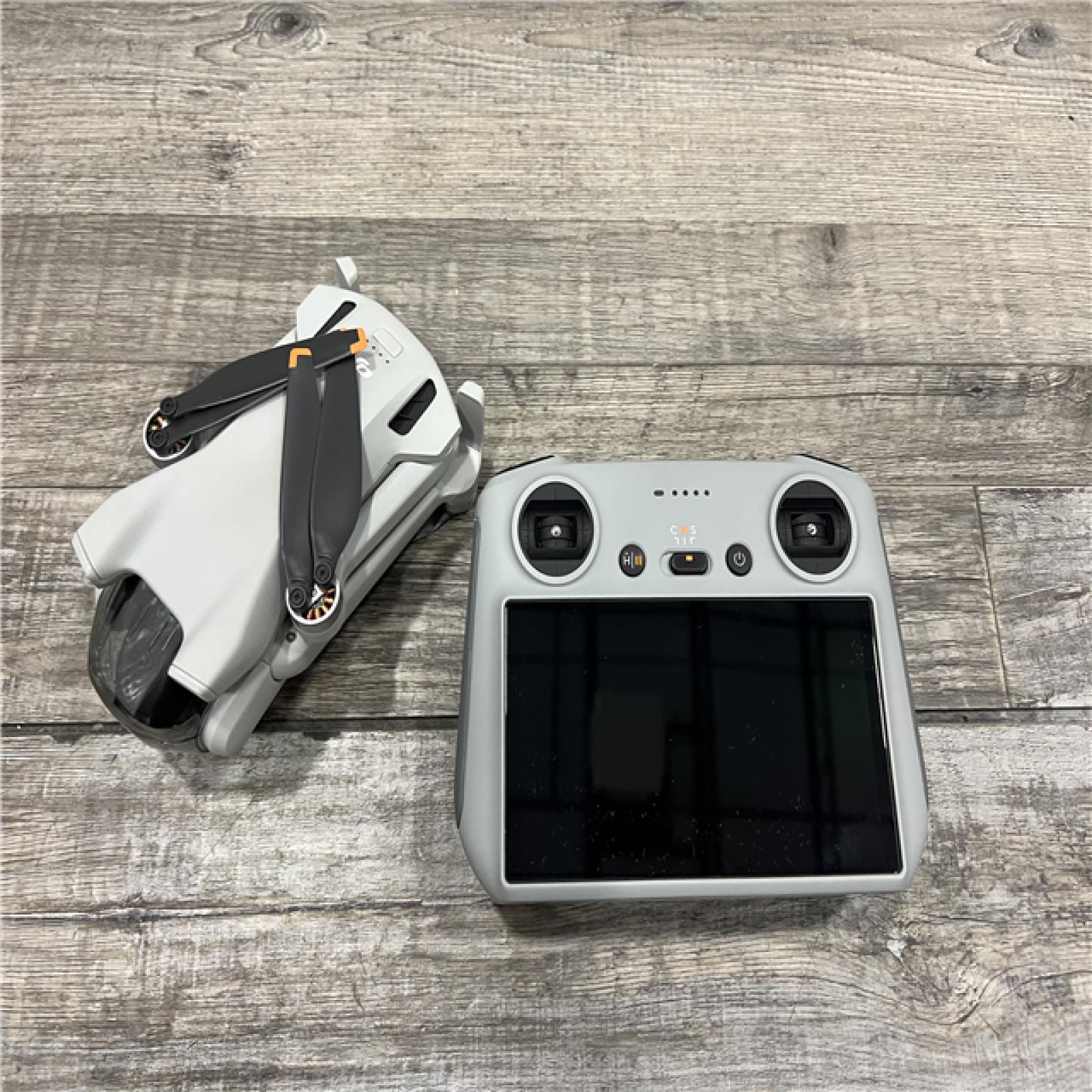 AS-IS DJI - Mini 3 Drone and Remote Control with Built-in Screen (DJI RC) - Gray