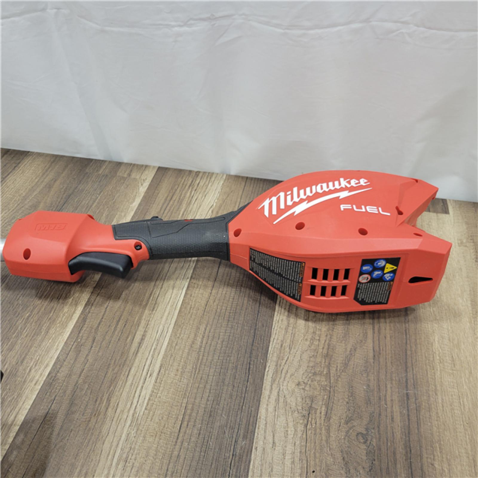AS-IS MILWAUKEE  M18 FUEL 18V 16 in. Brushless Cordless Battery Powered String Trimmer W/QUIK-LOK Attachment Capability & 8.0 Ah Battery