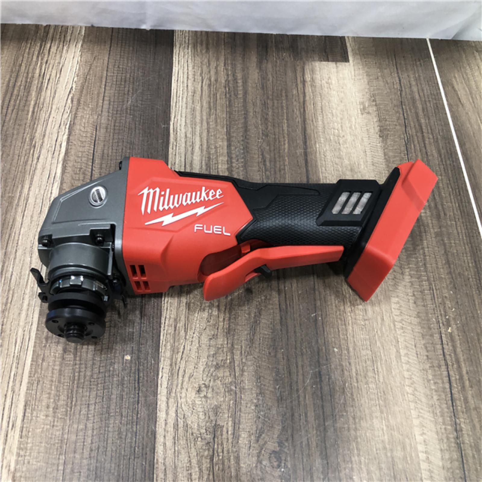 AS-IS Milwaukee FUEL 18V Lithium-Ion Brushless Cordless 4-1/2 in./5 in. Grinder w/Paddle Switch (Tool-Only)