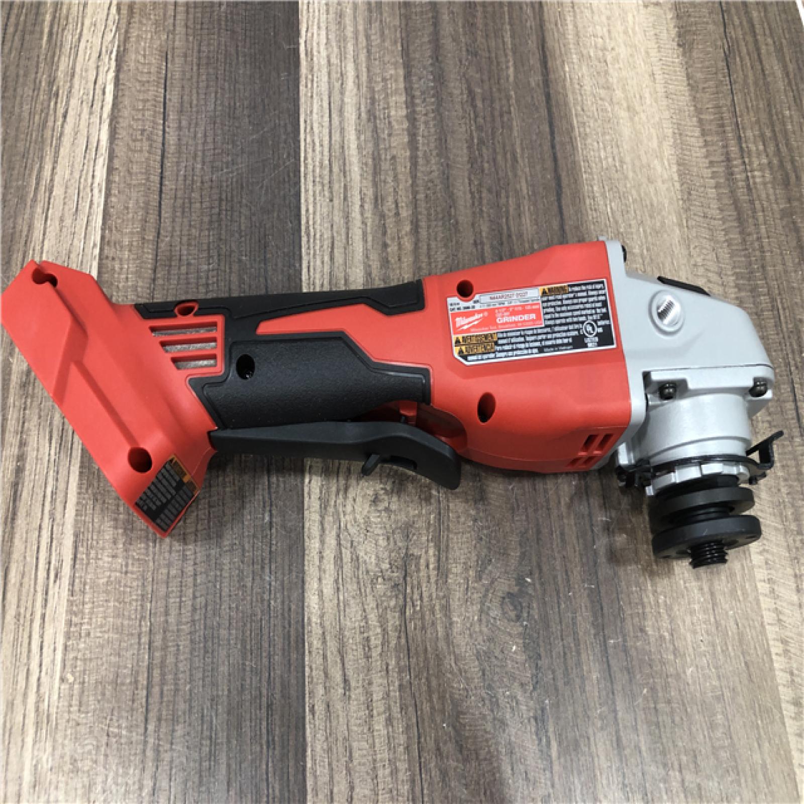 AS-IS Milwaukee 18V Lithium-Ion Brushless Cordless 4-1/2 in./5 in. Grinder w/Paddle Switch (Tool-Only)