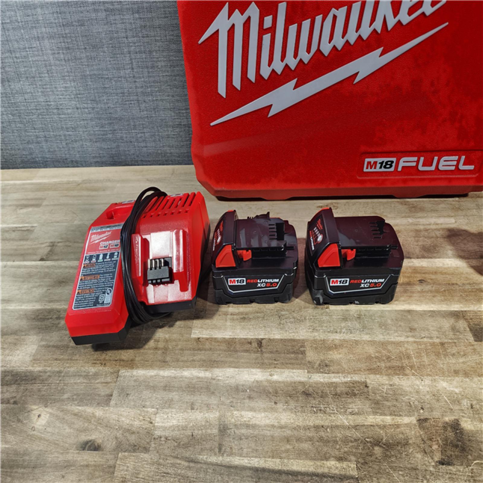 HOUSTON LOCATION - AS-IS MILWAUKEE FUEL 18V Lithium-Ion Brushless Cordless Hammer Drill and Impact Driver Combo Kit (2-Tool) with 2 Batteries