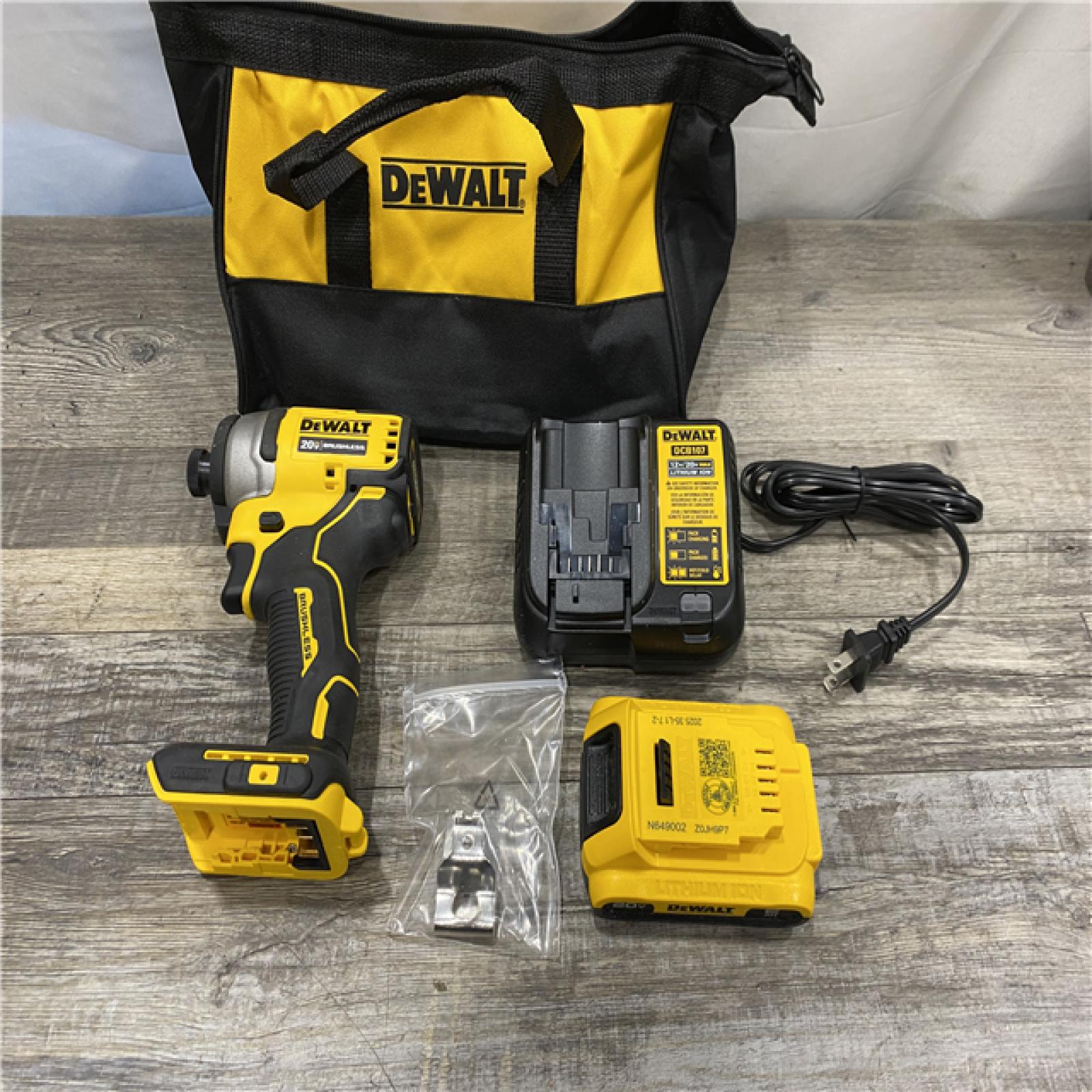AS-IS DEWALT Atomic 20V Max Lithium-Ion Brushless Cordless Compact 1/4 in. Impact Driver Kit