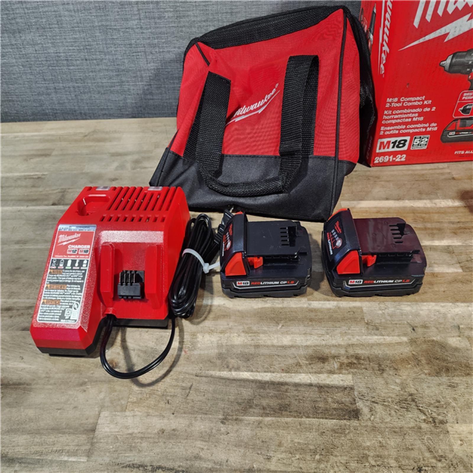 HOUSTON LOCATION - AS-IS Milwaukee 18V Cordless Brushed 2-Tool Drill/Driver and Impact Driver Kit