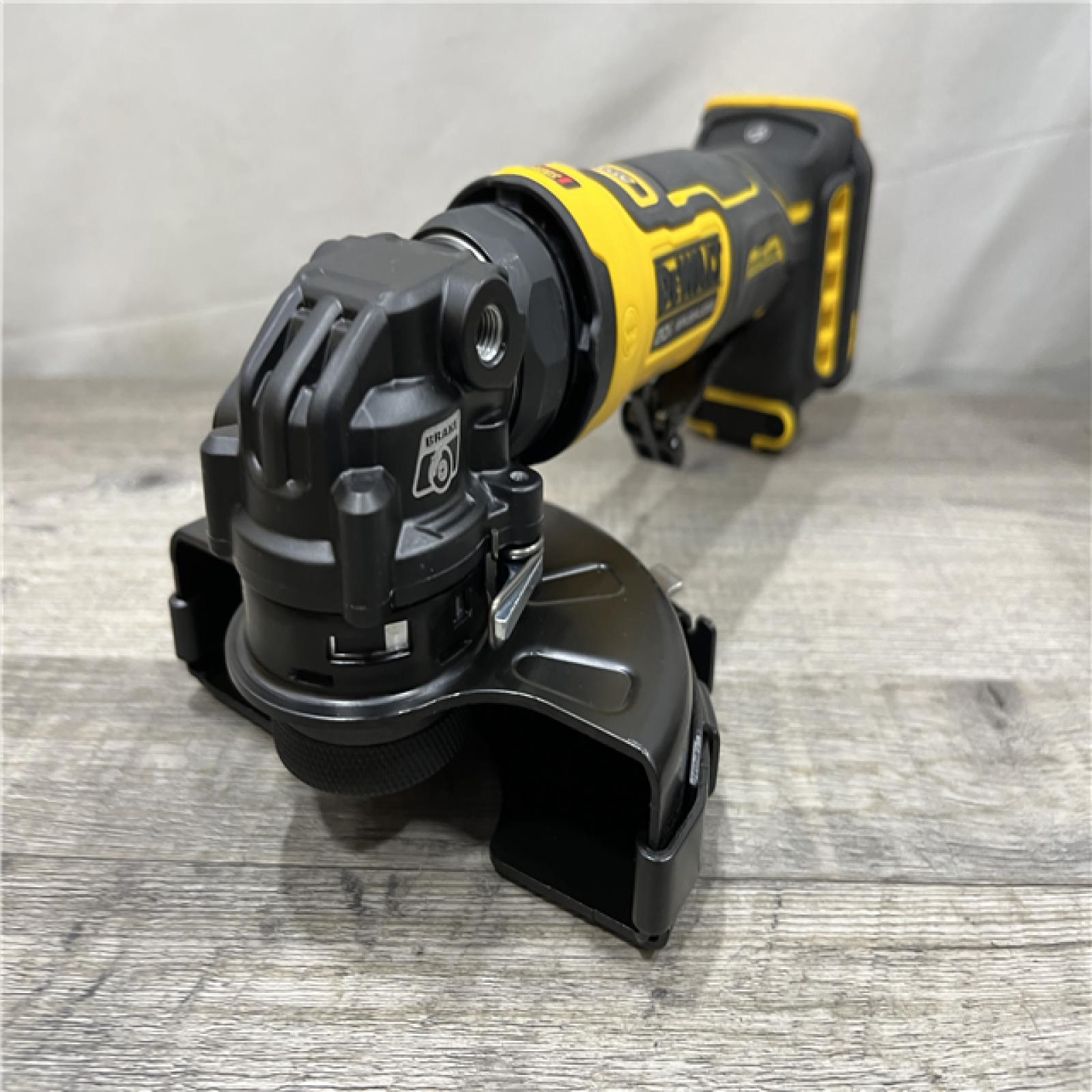 AS-IS DEWALT ATOMIC 20V MAX Cordless 4-1/2 in. Angle Grinder with Paddle Switch (Tool Only)