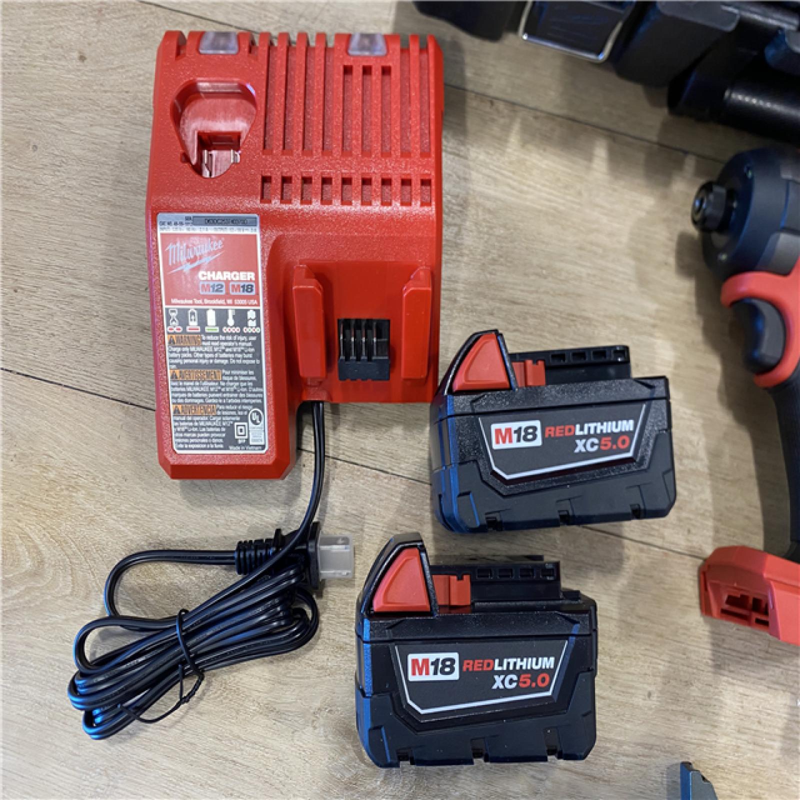AS-IS Milwaukee FUEL 18V Lithium-Ion Brushless Cordless Hammer Drill and Impact Driver Combo Kit