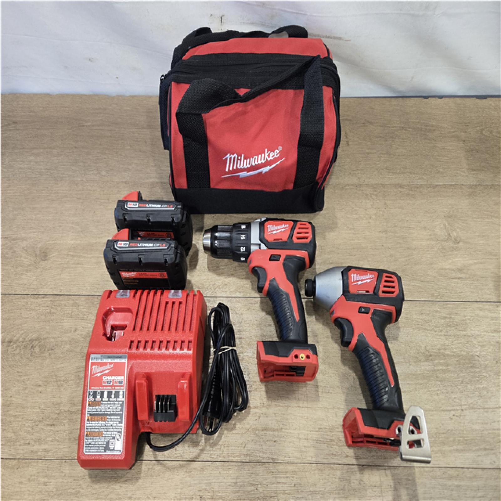 AS-IS Milwaukee 18V Lithium-Ion Cordless Drill Driver/Impact Driver Combo Kit