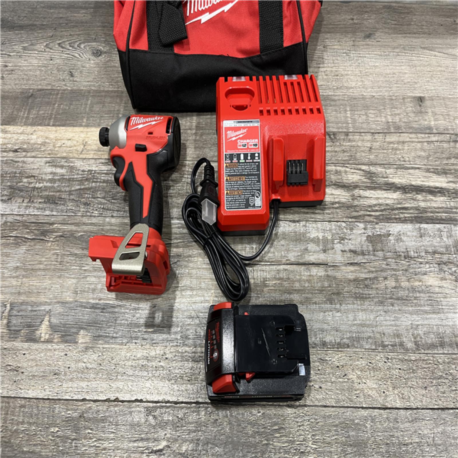 AS-IS Milwaukee 18-Volt Lithium-Ion Compact Brushless Cordless 1/4 in. Impact Driver Kit