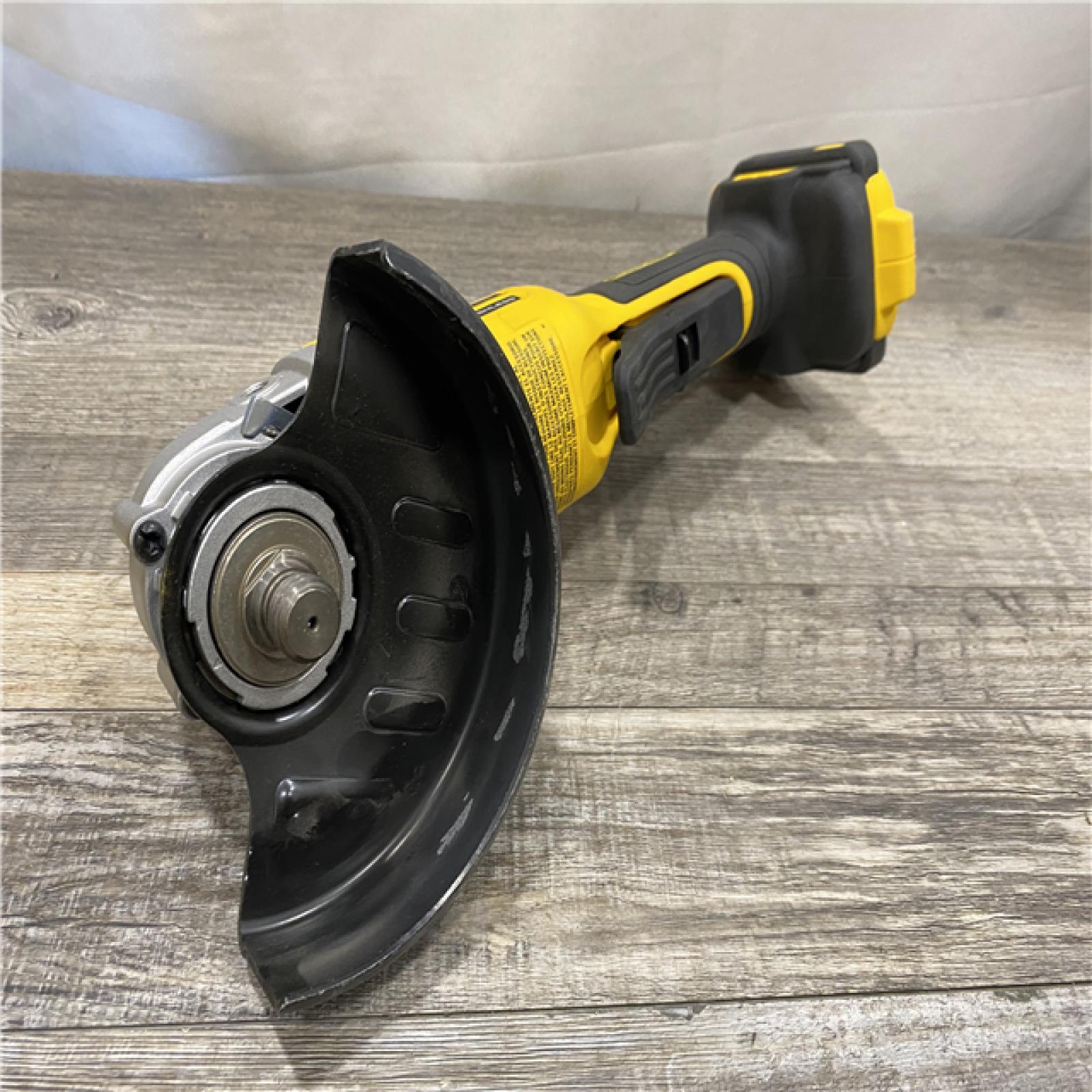 AS-IS DEWALT 20V MAX Cordless Brushless 4-1/2 in. Angle Grinder with Paddle Switch (Tool Only)