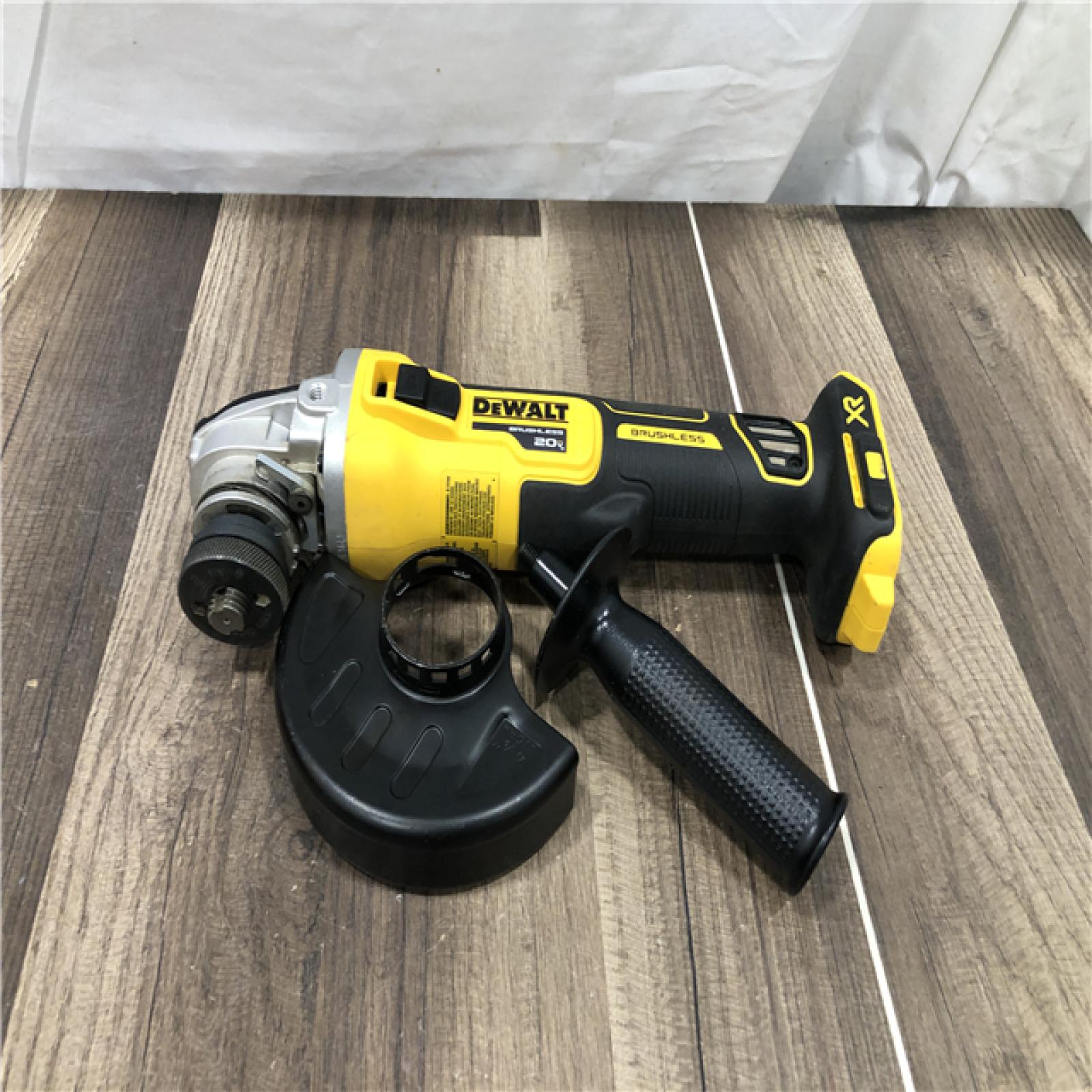 AS-IS DEWALT 20V MAX XR Cordless Brushless 4.5 in. Slide Switch Small Angle Grinder with Kickback Brake (Tool Only)