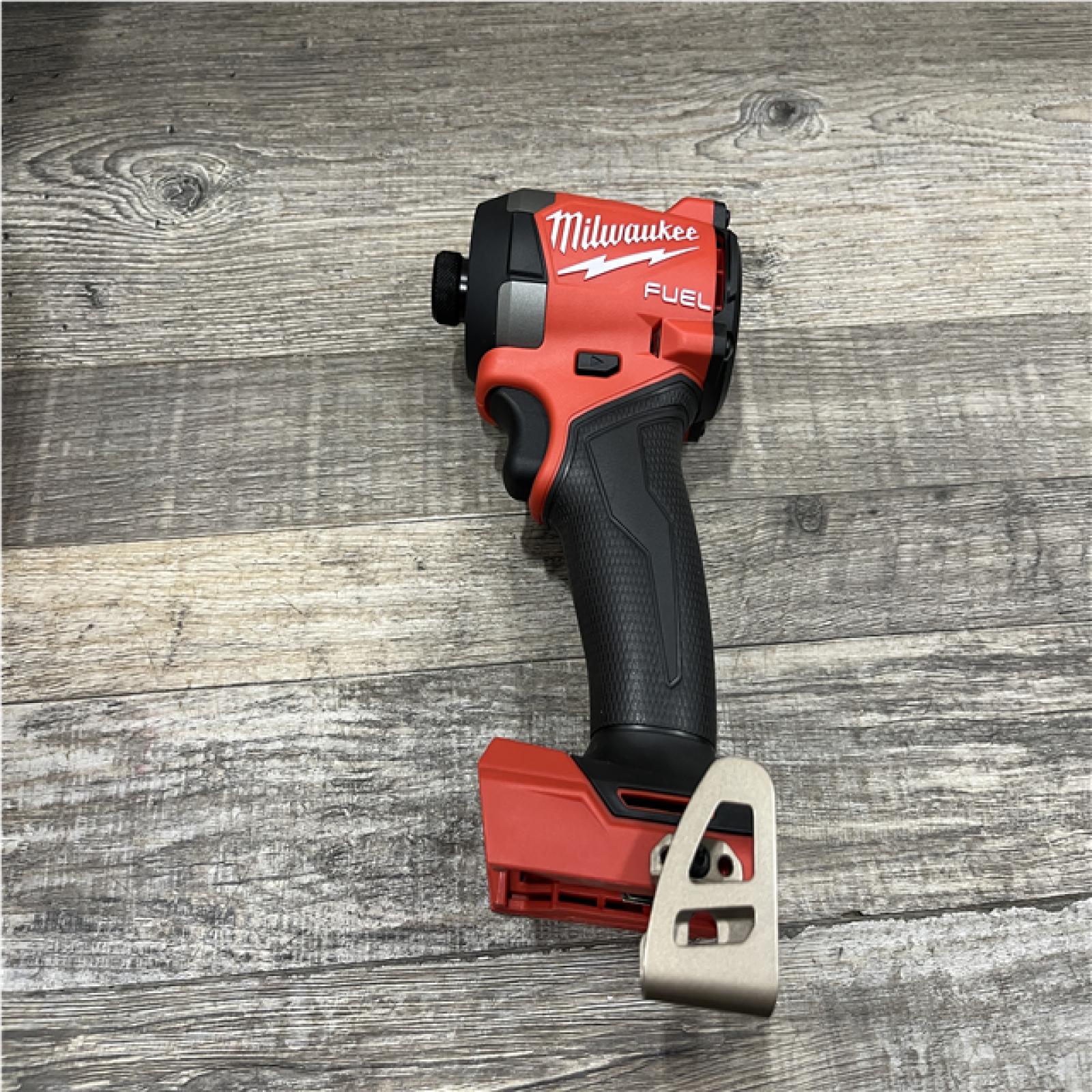 AS-IS Milwaukee FUEL 18V Lithium-Ion Brushless Cordless Hammer Drill and Impact Driver Combo Kit