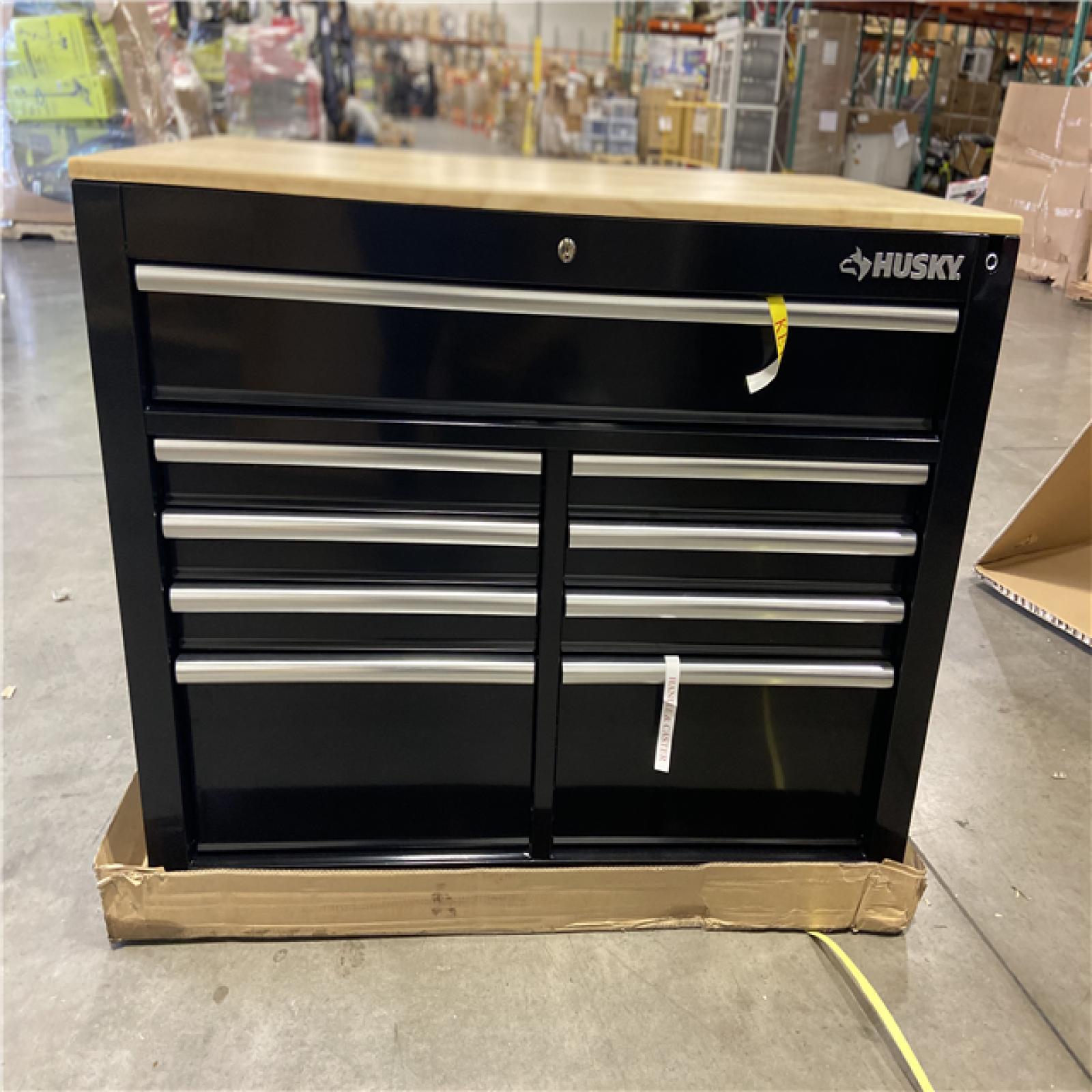 DALLAS LOCATION - Husky 46 in. x 25 in. D 9-Drawer Mobile Workbench with Adjustable Height Wood Top in Gloss Black