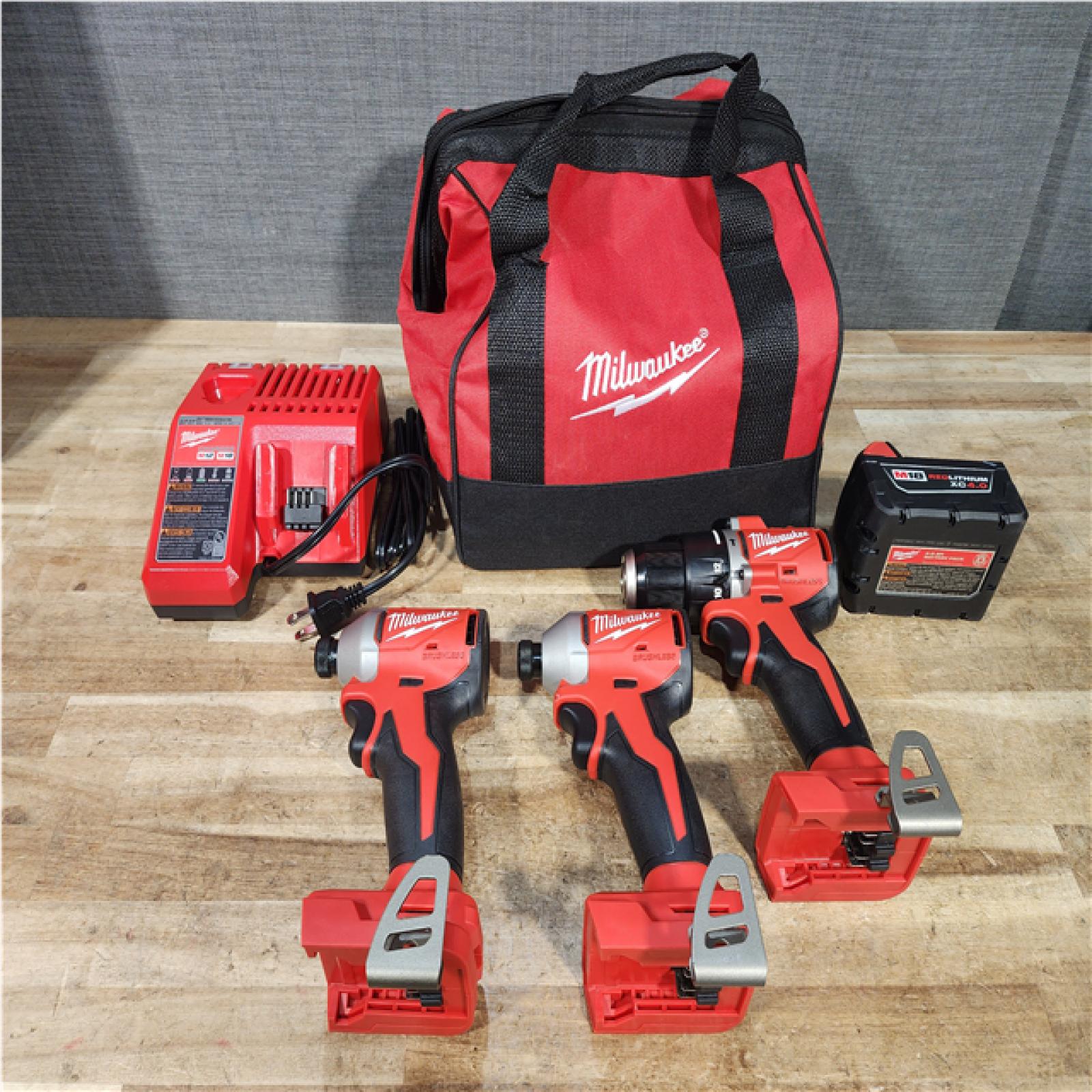 Houston Location AS-IS Milwaukee Drill Driver and Impact Driver QTY/2 and Battery with Charger