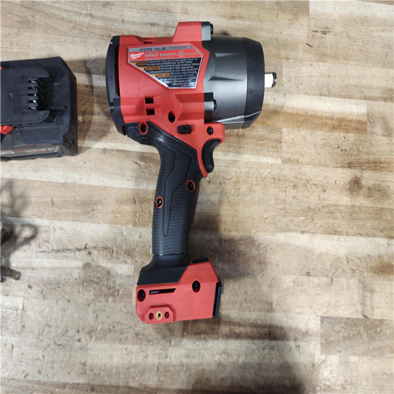 HOUSTON LOCATION - AS - IS Milwaukee FUEL 18V Lithium-Ion Brushless Cordless 1/2 in. Impact Wrench with Friction Ring W/ BATTERY & CHARGER