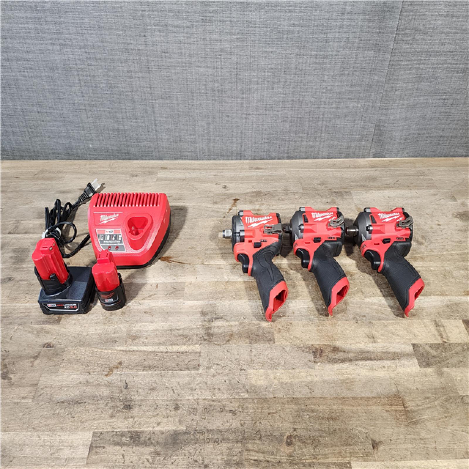 HOUSTON LOCATION - AS-IS MILWAUKEE 3 TOOL COMBO KIT W/ (2) BATTERY & CHARGER