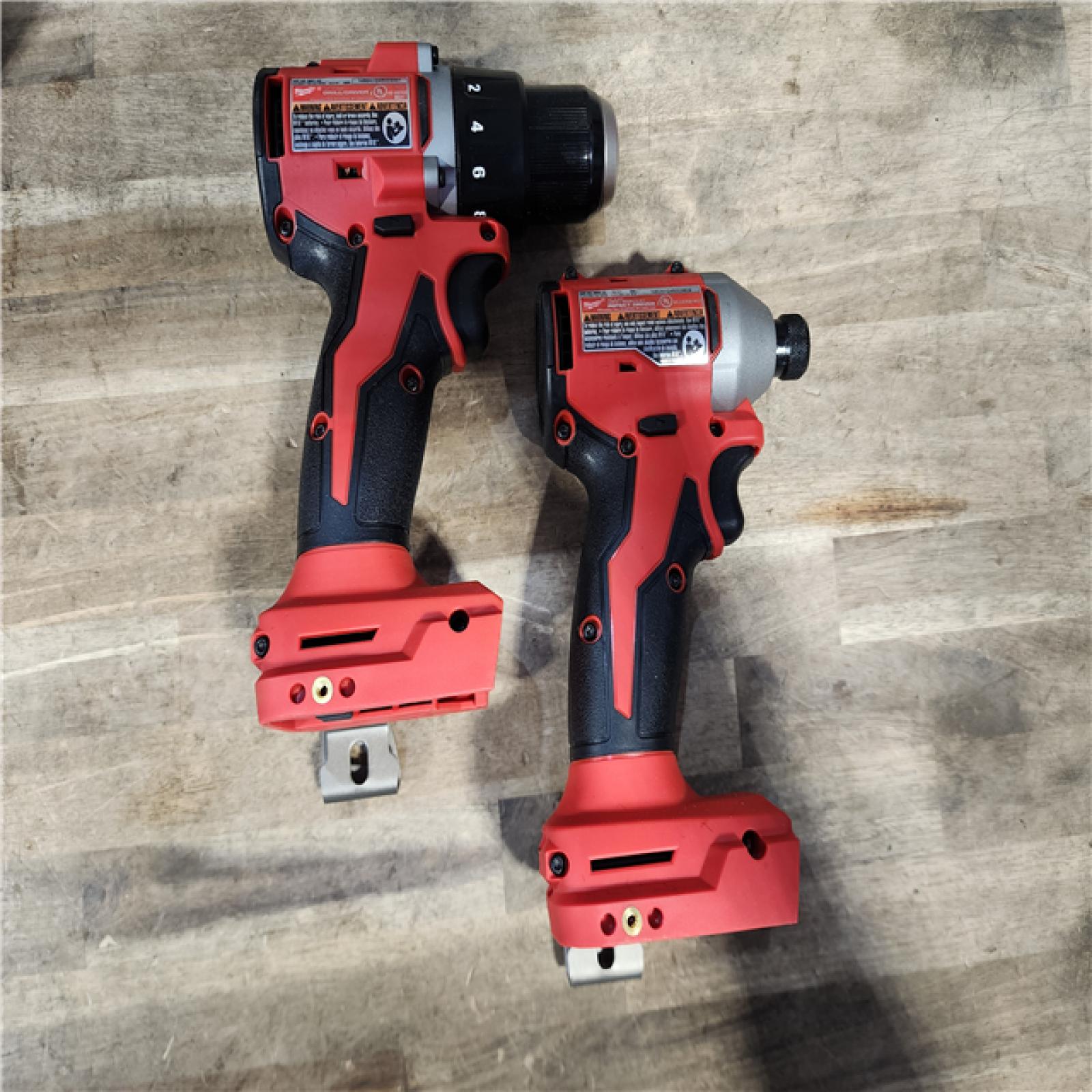 HOUSTON LOCATION - AS-IS Milwaukee M18 18V Lithium-Ion Brushless Cordless Compact Drill/Impact Combo Kit (2-Tool) W/(2) 2.0 Ah Batteries  Charger & Bag