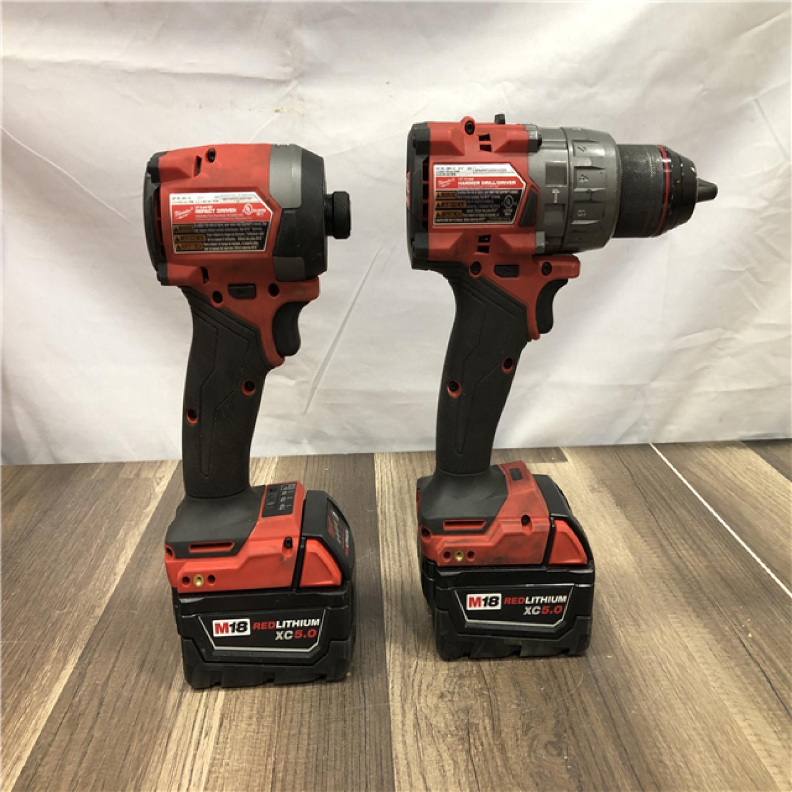 AS-IS Milwaukee  FUEL 18V Lithium-Ion Brushless Cordless Hammer Drill and Impact Driver Combo Kit