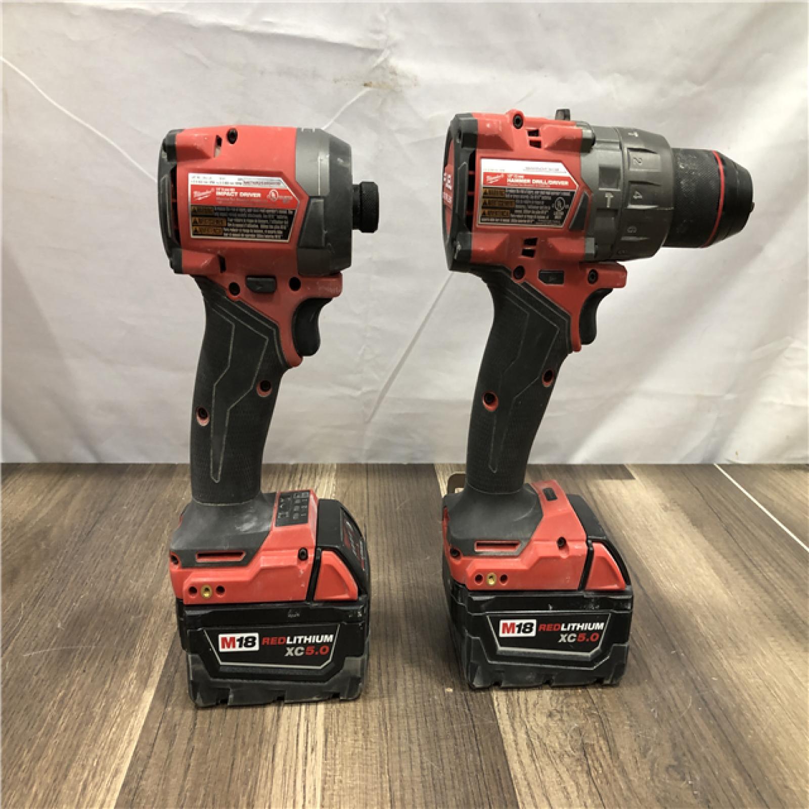 AS-IS Milwaukee FUEL 18V Lithium-Ion Brushless Cordless Hammer Drill and Impact Driver Combo Kit