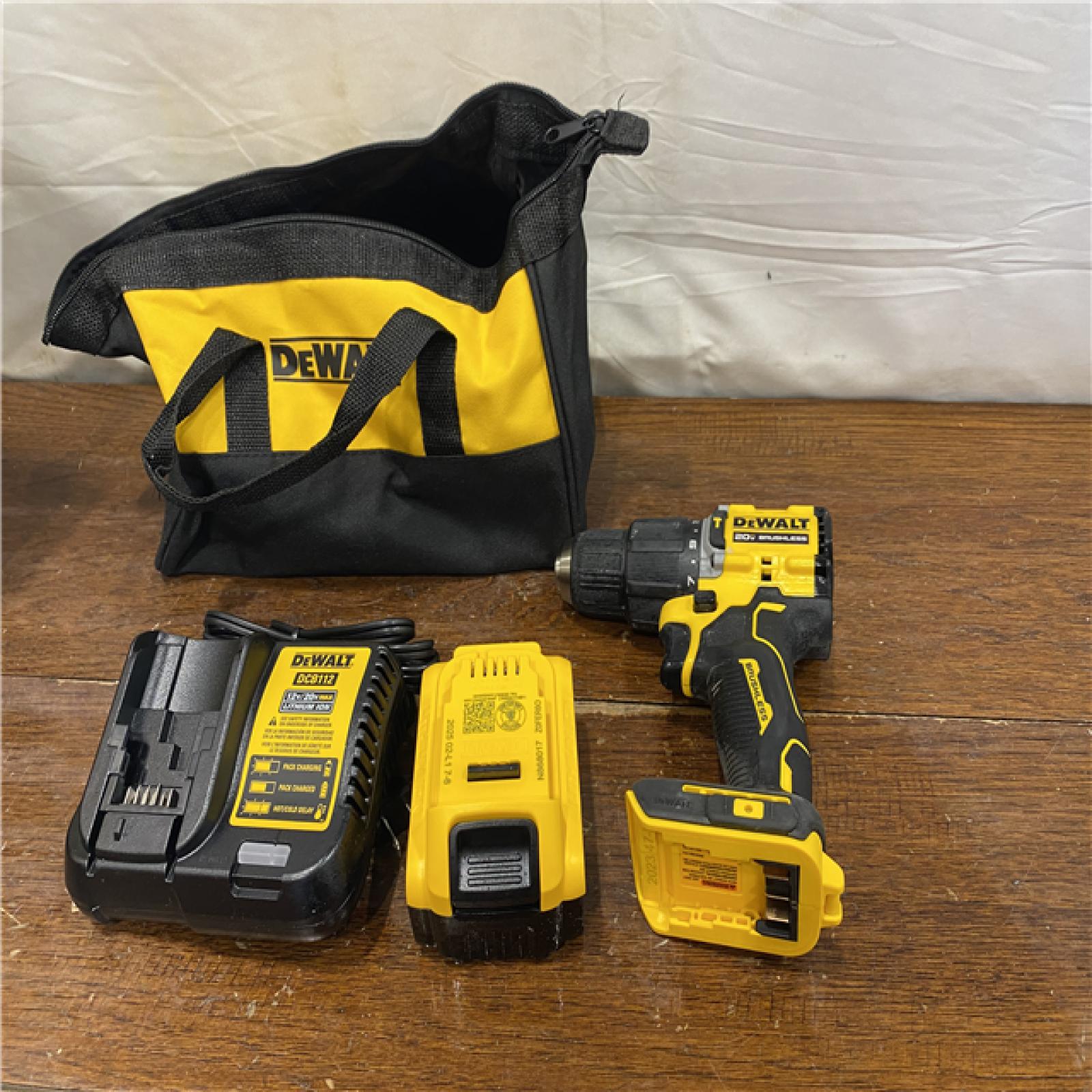 AS-IS DEWALT ATOMIC 20-Volt Lithium-Ion Cordless 1/2 in. Compact Hammer Drill with 3.0Ah Battery, Charger and Bag