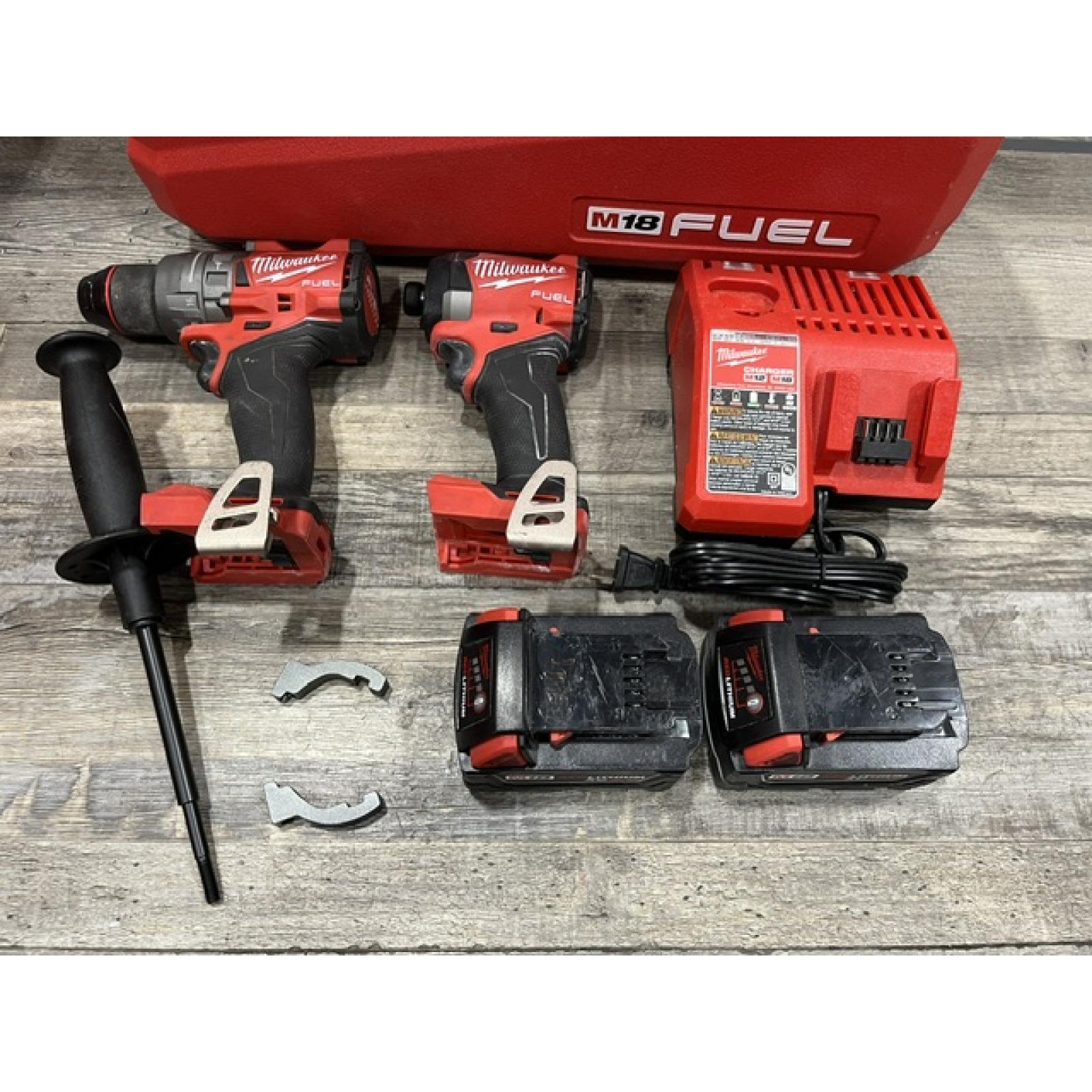 AS-IS Milwaukee FUEL 18V Lithium-Ion Brushless Cordless Hammer Drill and Impact Driver Combo Kit