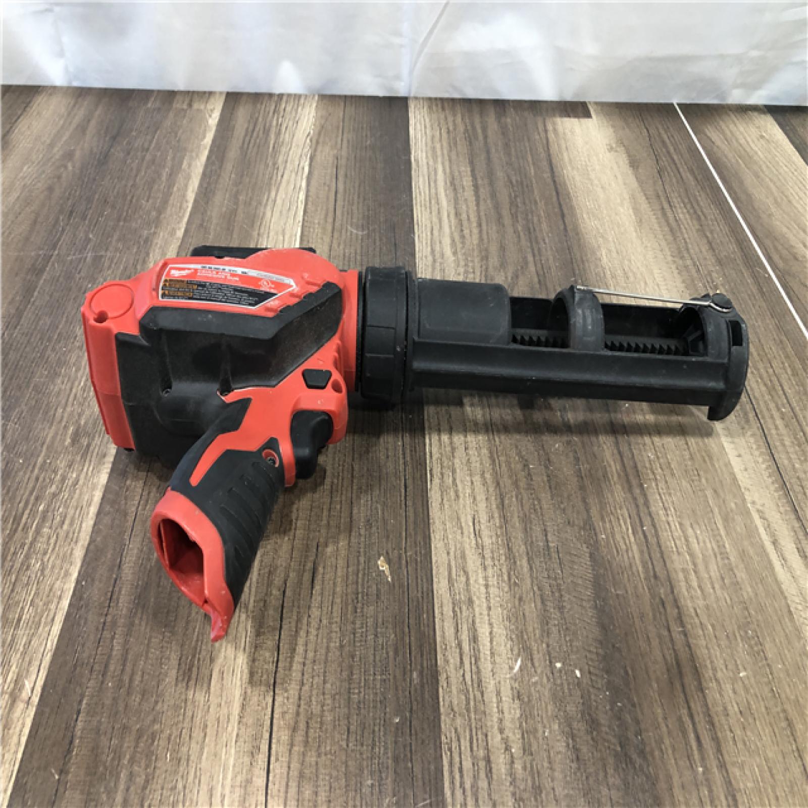 AS-IS Milwaukee 12V Lithium-Ion Cordless 10 oz. Adhesive and Caulk Gun (Tool-Only)