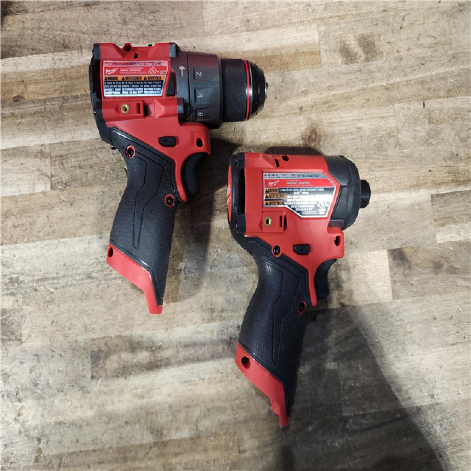 HOUSTON LOCATION - AS-IS Milwaukee FUEL 12-Volt Lithium-Ion Brushless Cordless Hammer Drill and Impact Driver Combo Kit