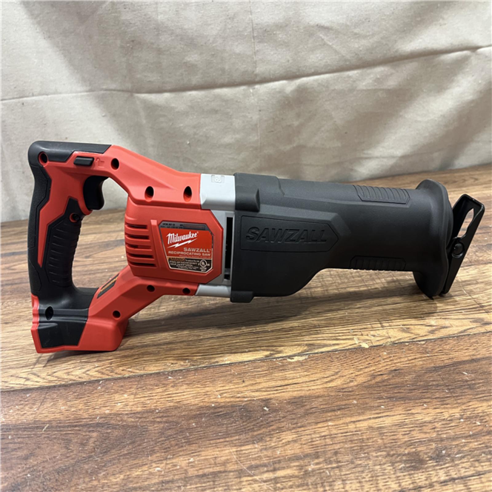 AS-IS MILWAUKEE M18 18V Lithium-Ion Cordless Combo Tool Kit with Two 3.0Ah Batteries, 1-Charger, 1-Tool Bag (4-Tool)