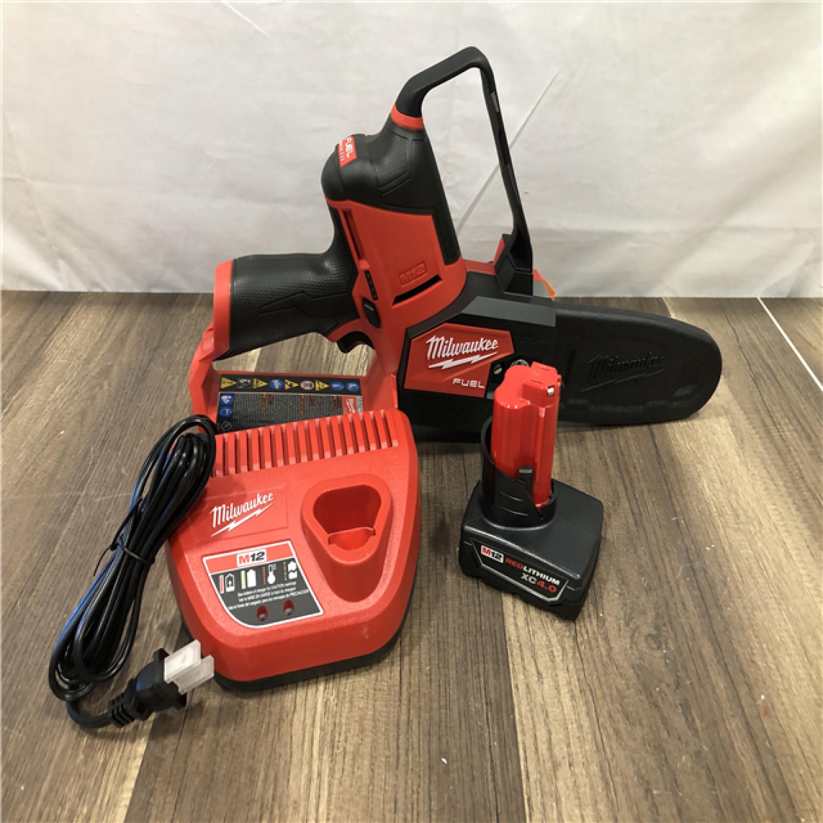 AS-IS Milwaukee FUEL 12V Lithium-Ion Brushless Battery 6 in. HATCHET Pruning Saw Kit