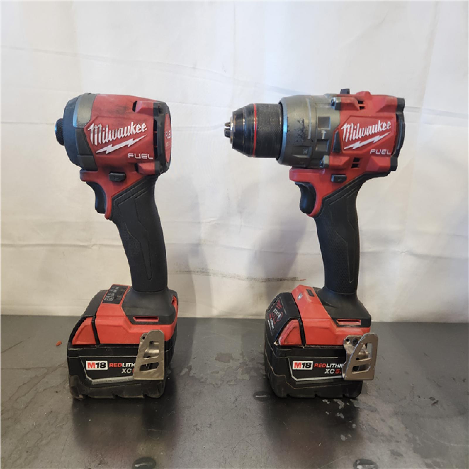 AS-IS- Milwaukee FUEL 18V Lithium-Ion Brushless Cordless Hammer Drill and Impact Driver Combo Kit