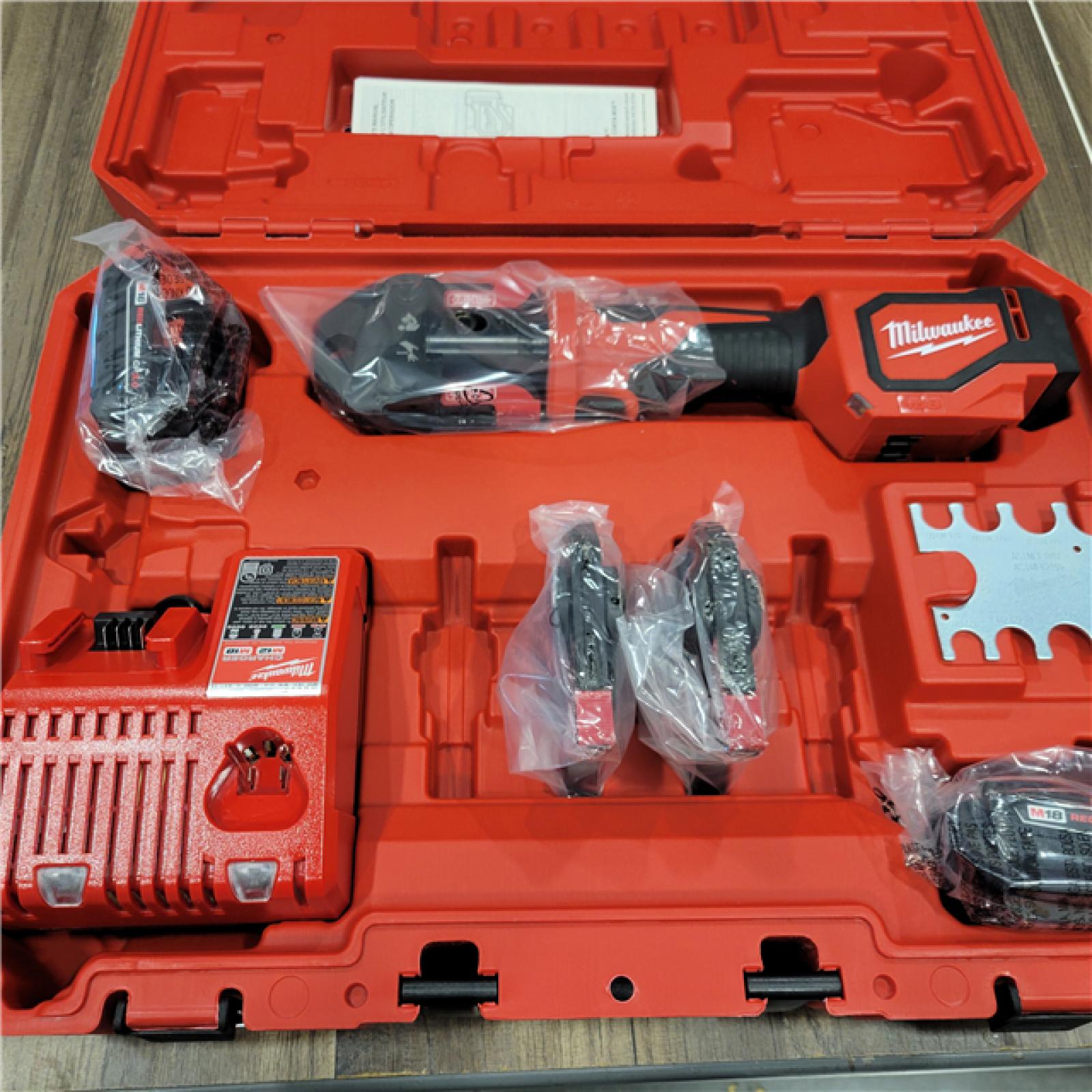 AS-IS M18 18V Lithium-Ion Cordless Short Throw Press Tool Kit with 3 PEX Crimp Jaws (2) 2.0 Ah Batteries and Charger