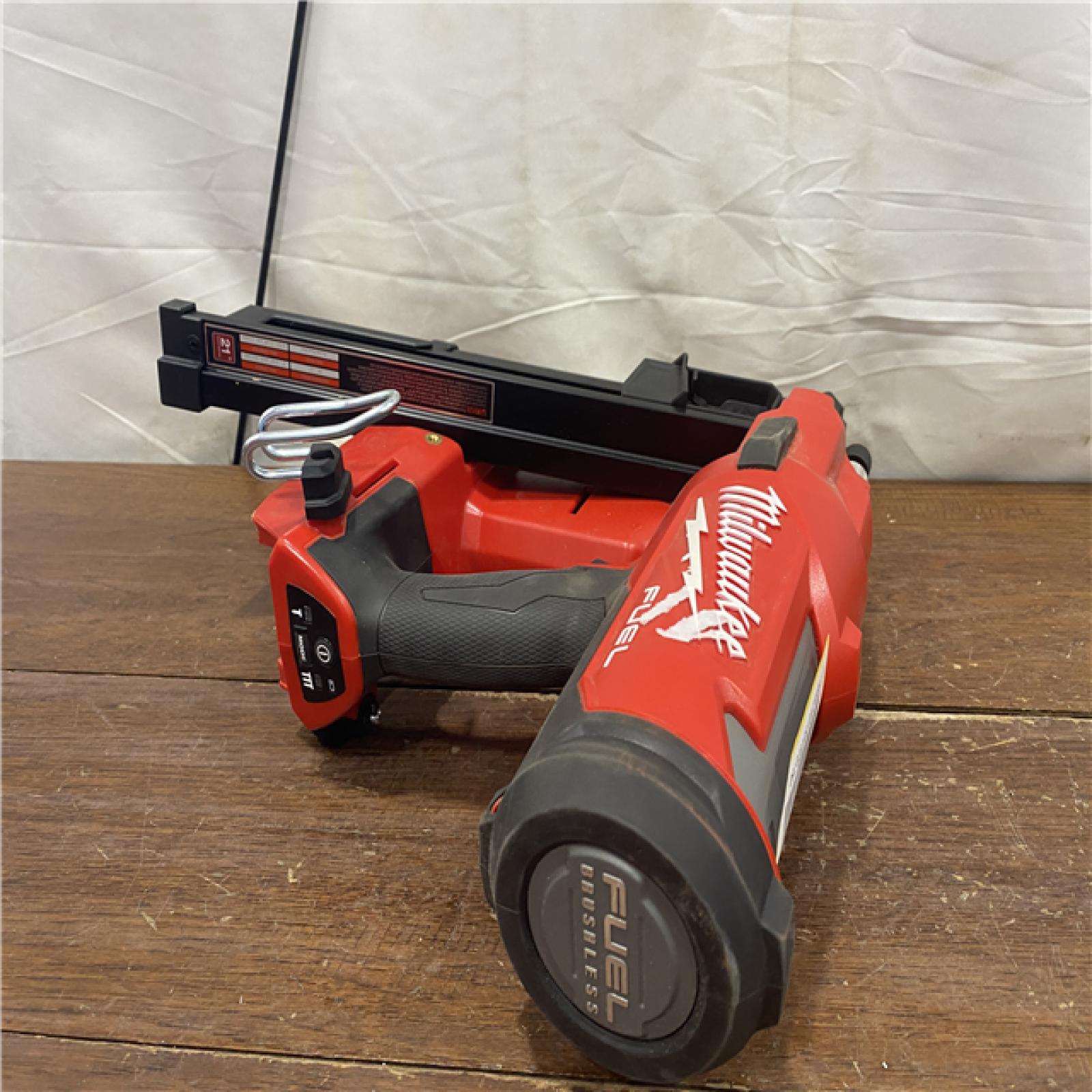 AS-IS Milwaukee 2744-20 M18 FUEL 3-1/2 in. 18-Volt 21-Degree Lithium-Ion Brushless Cordless Framing Nailer (Tool-Only)