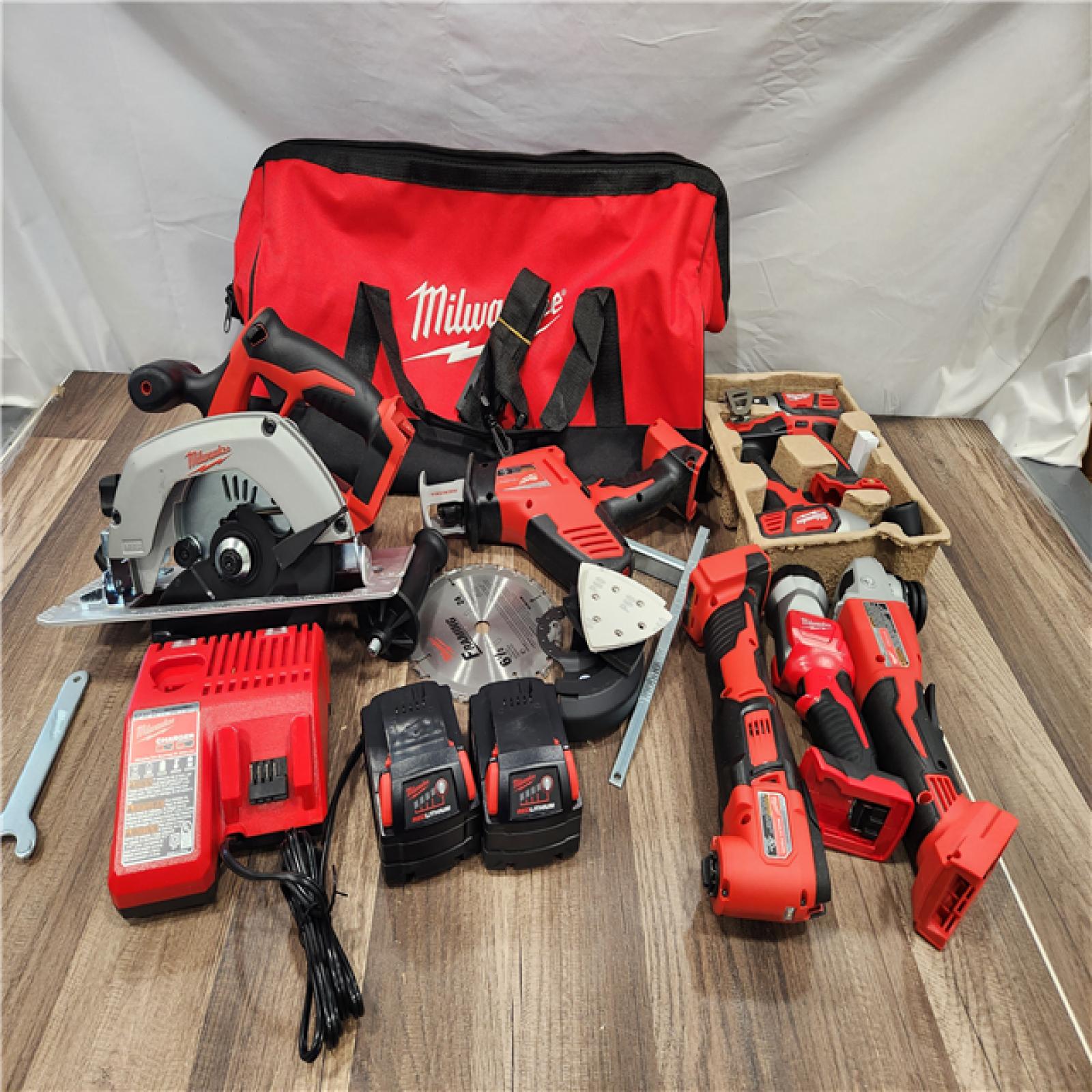 NEW! - M18 18-Volt Lithium-Ion Cordless Combo Kit 7-Tool with 2-Batteries, Charger and Tool Bag