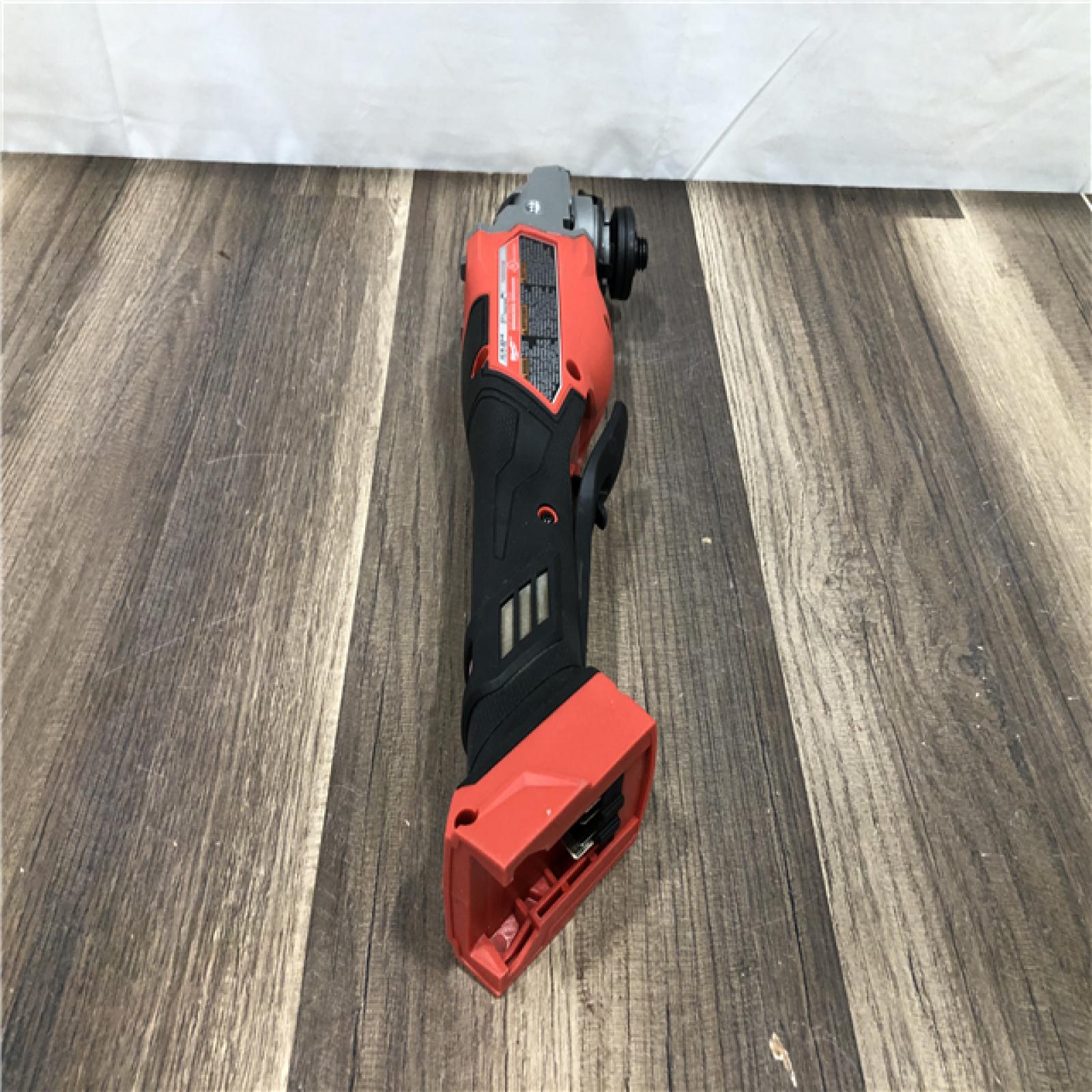 AS-IS Milwaukee FUEL 18-Volt Lithium-Ion Brushless Cordless 4-1/2 in./6 in. Braking Grinder with Paddle Switch (Tool-Only)